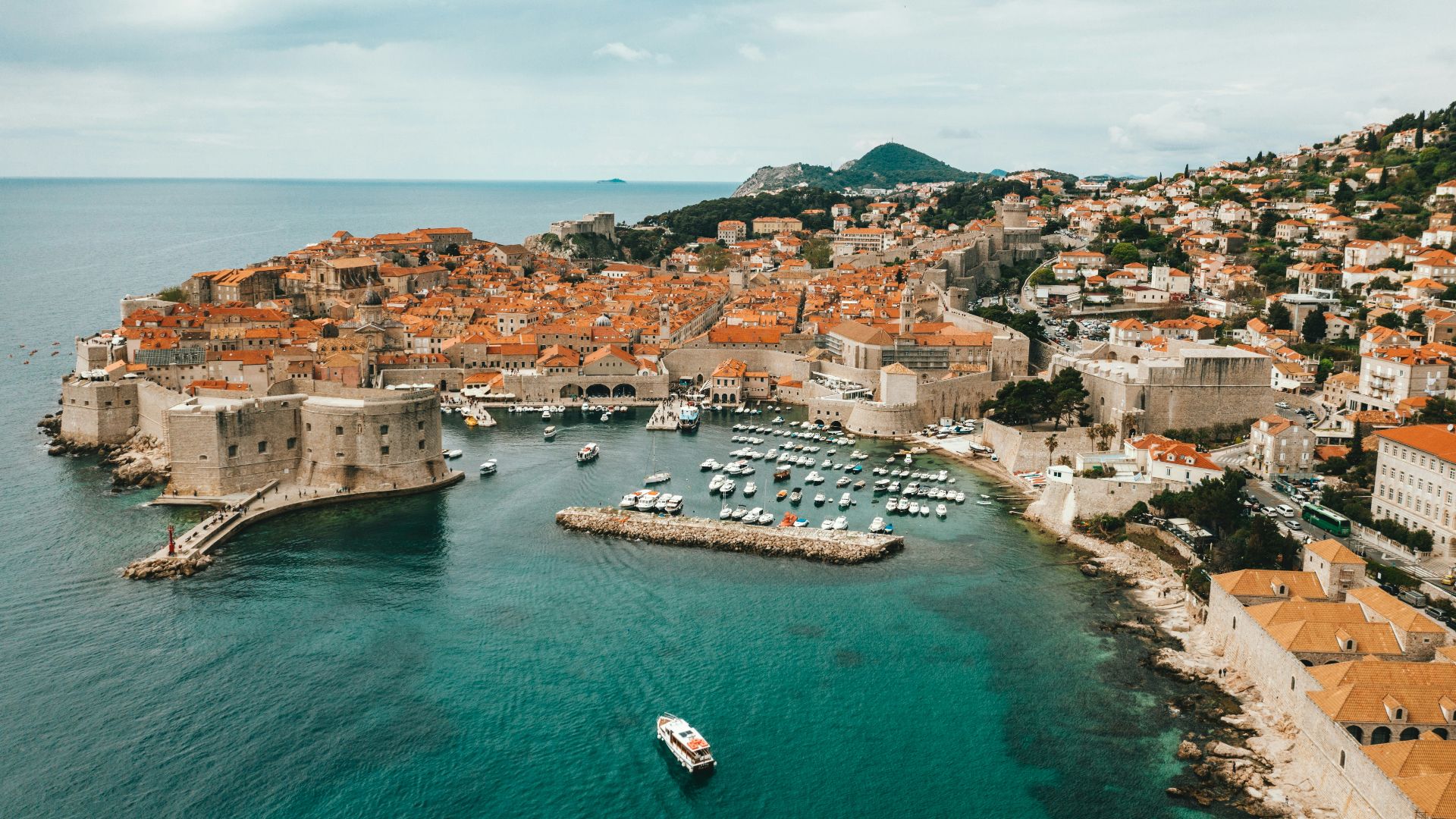 aerial view of buildings near ocean