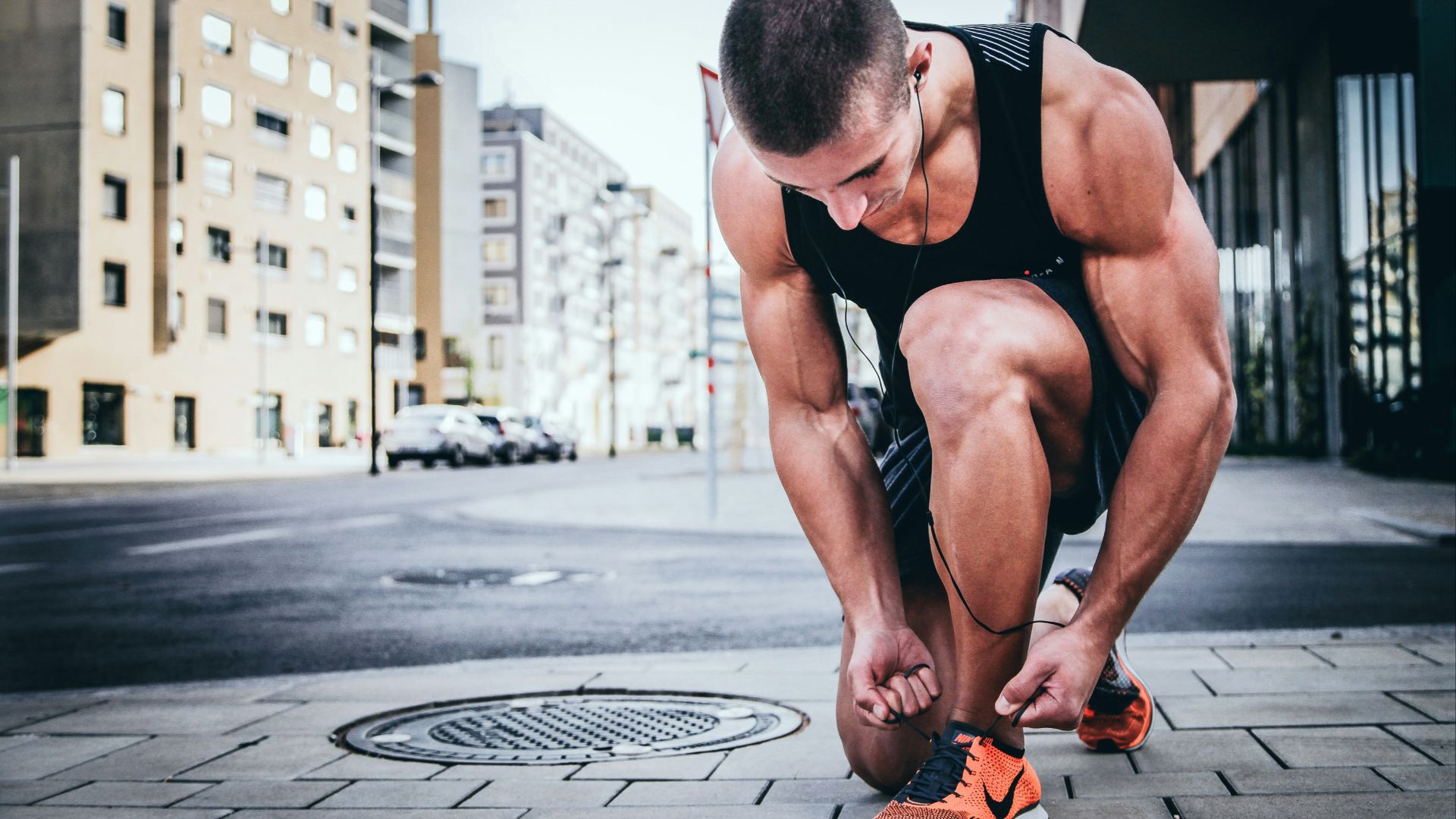 man tying his shoes