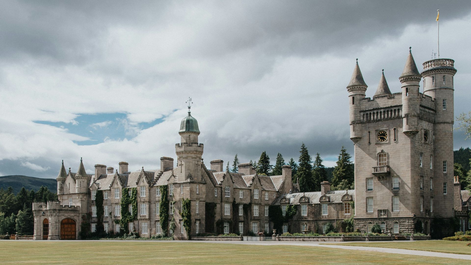 a large castle like building with a clock tower