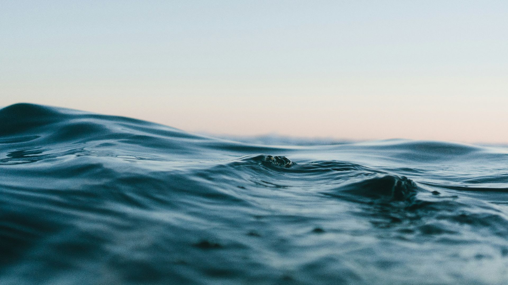 body of water under sky