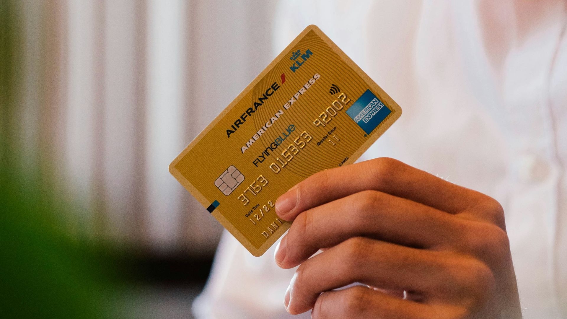 person holding credit card