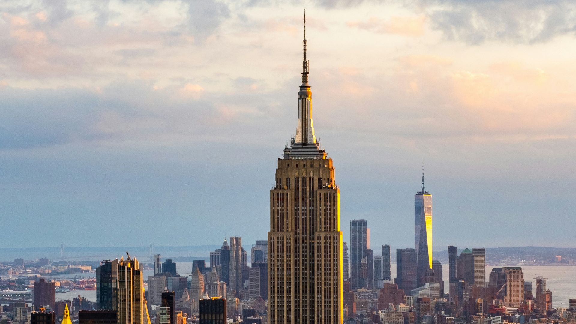 a city skyline with tall buildings