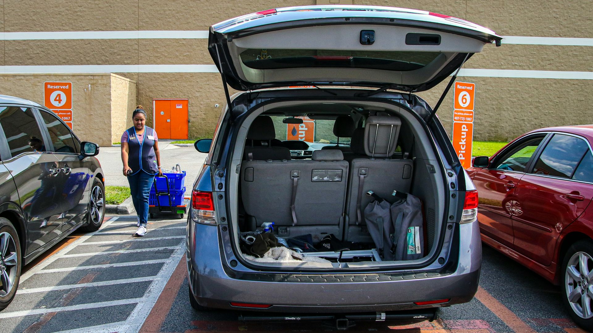 black car on pedestrian lane during daytime