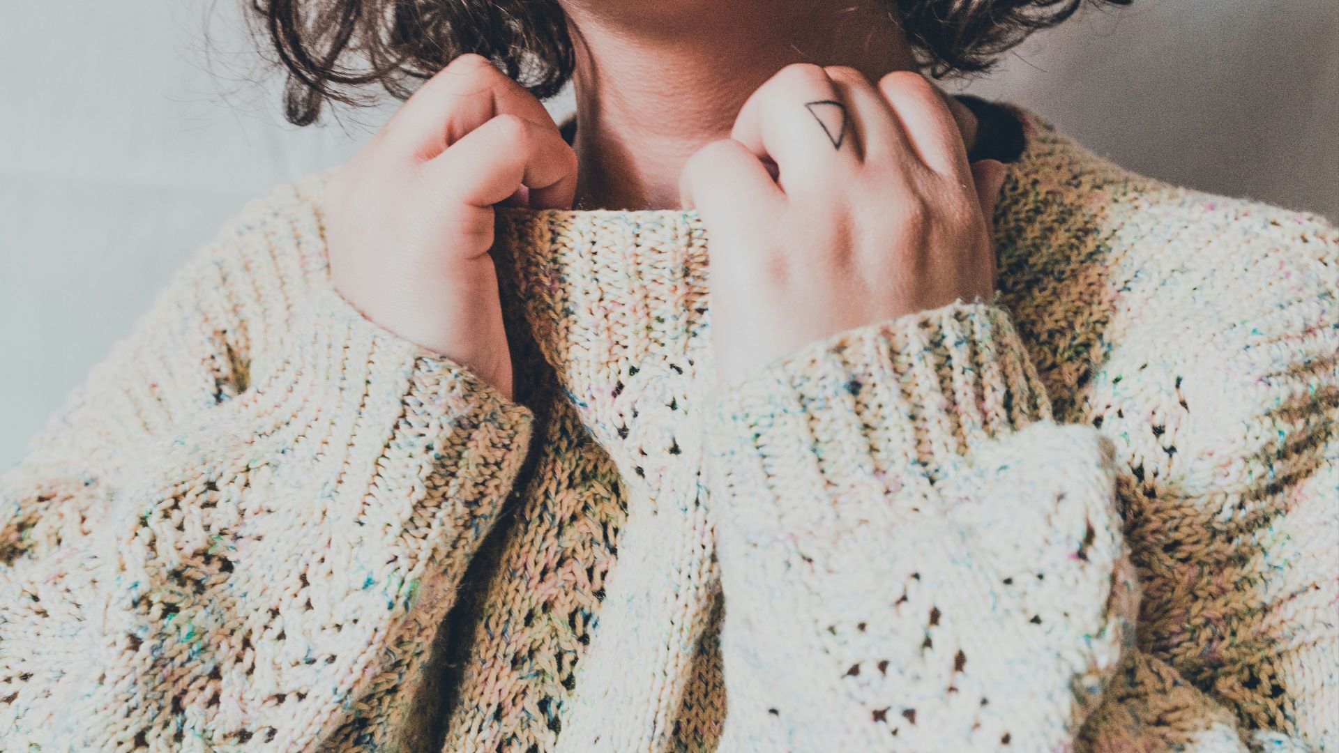 woman in white knit sweater