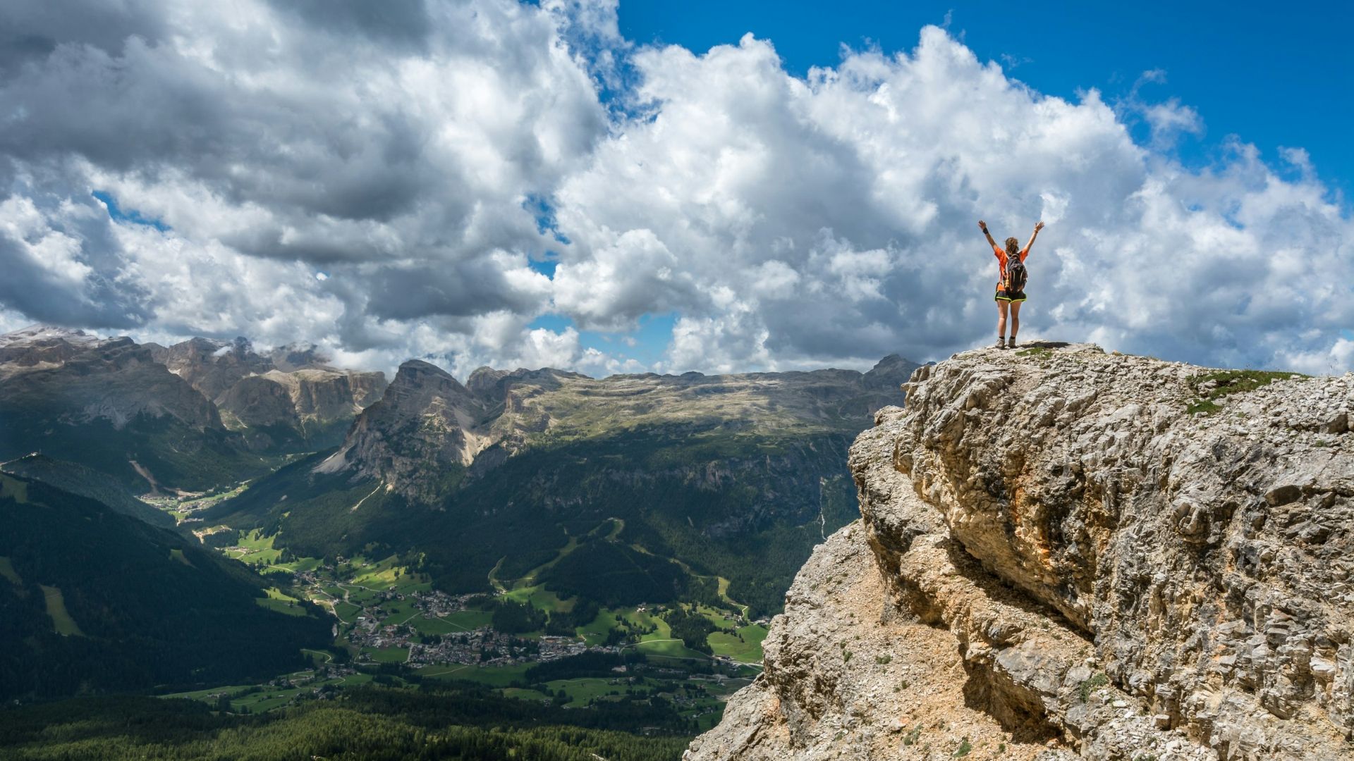 woman standing on mountain