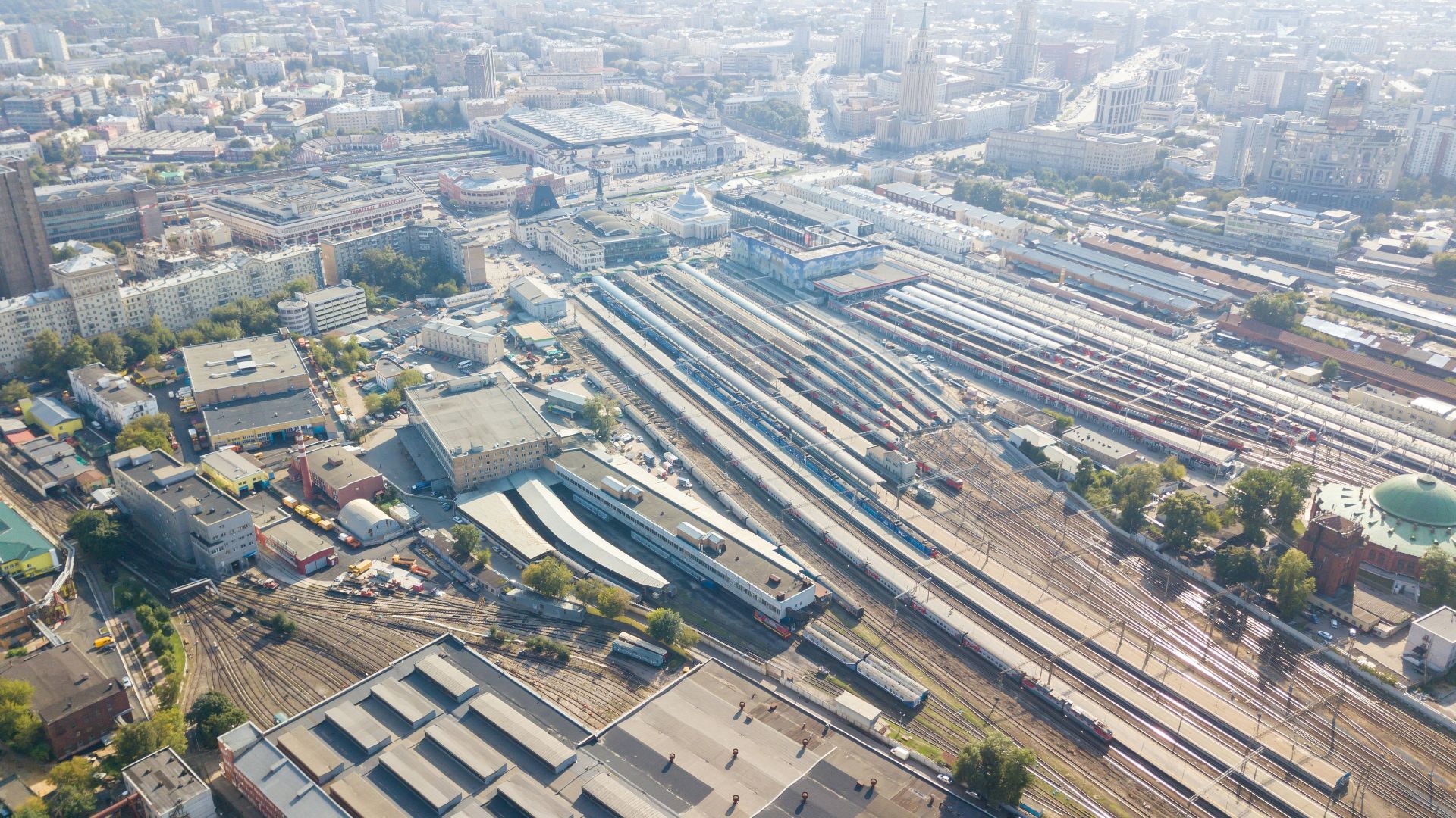 an aerial view of a train yard and train tracks