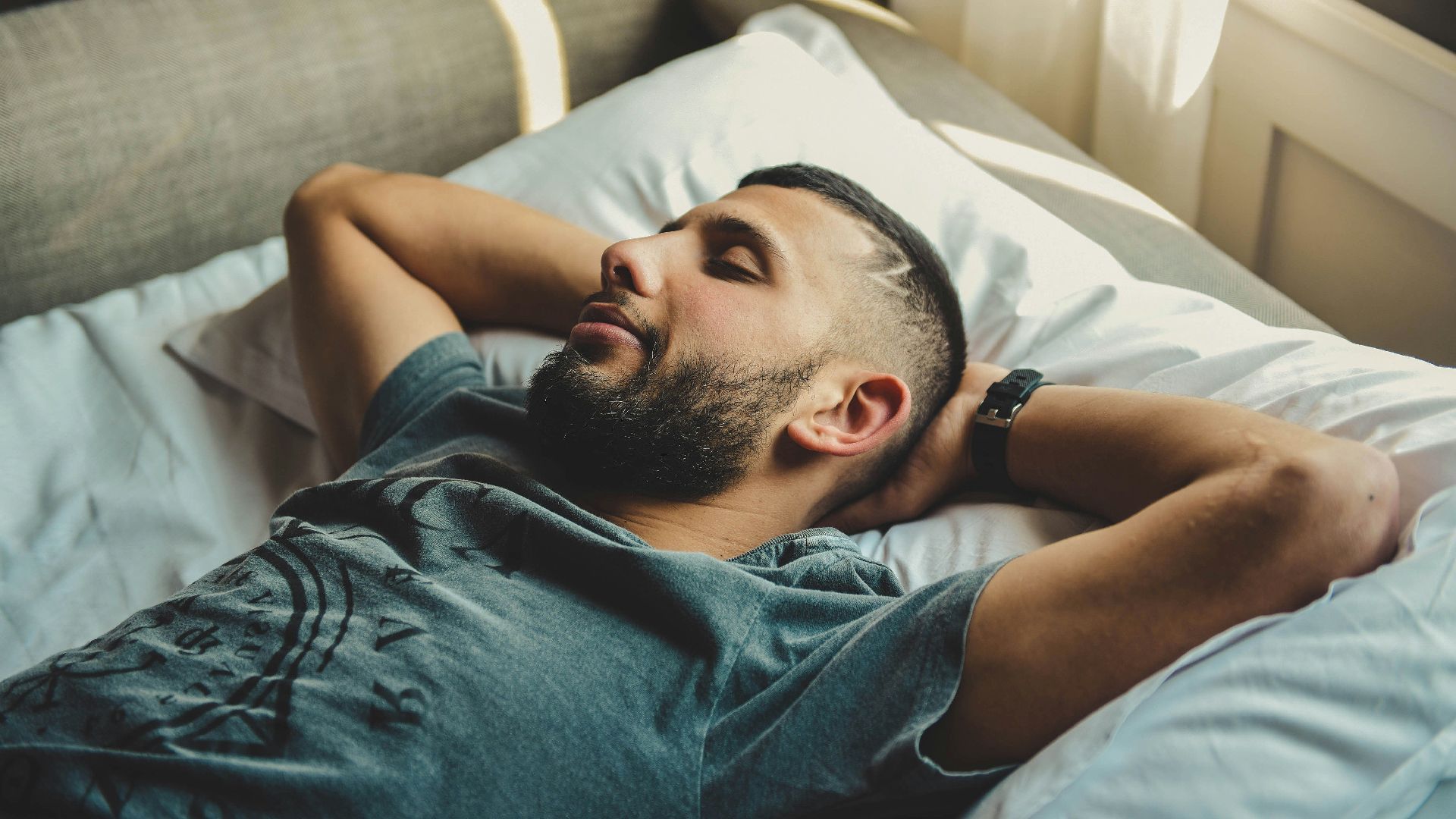 man lying on bed