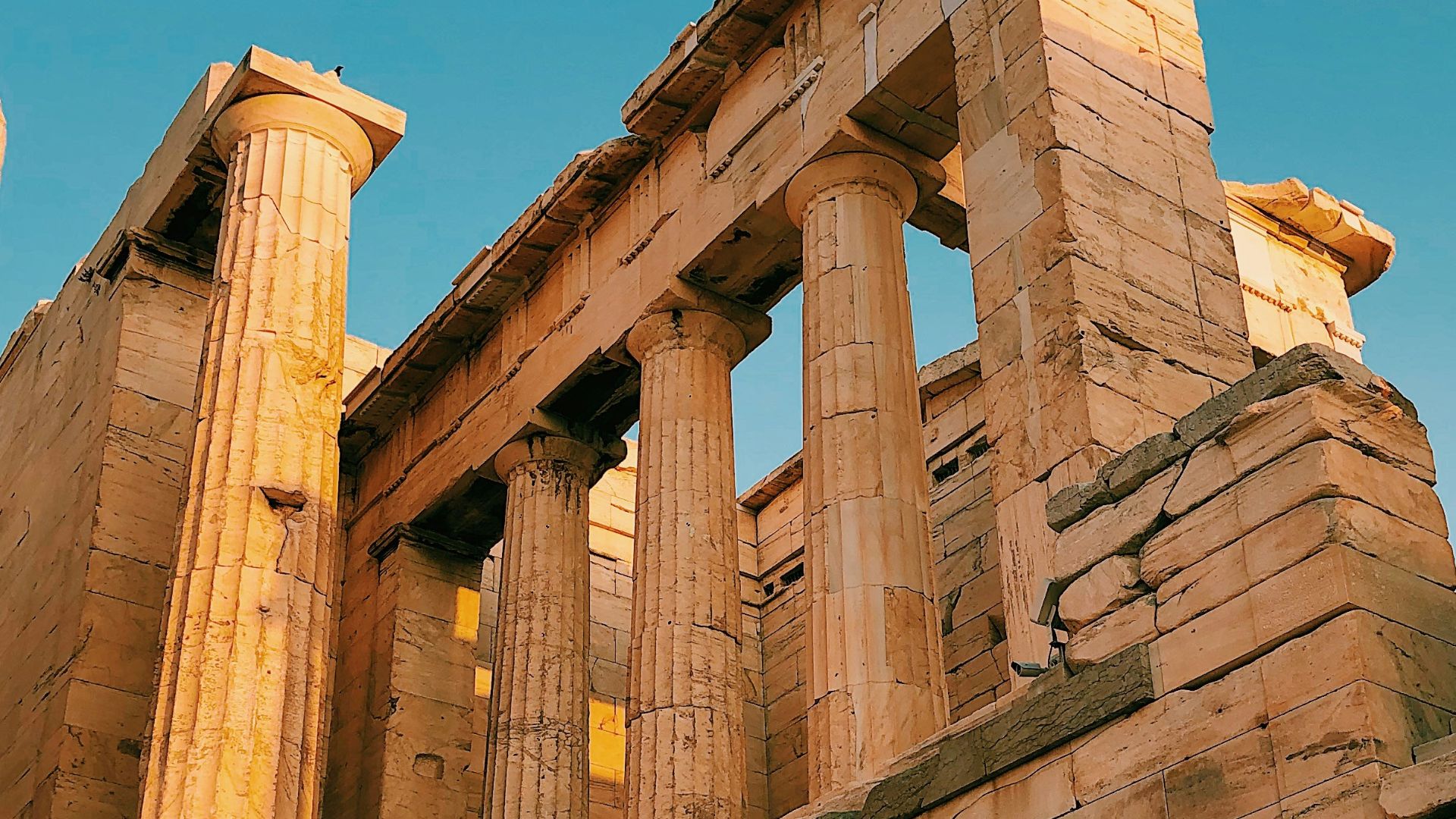 brown concrete building under blue sky during daytime