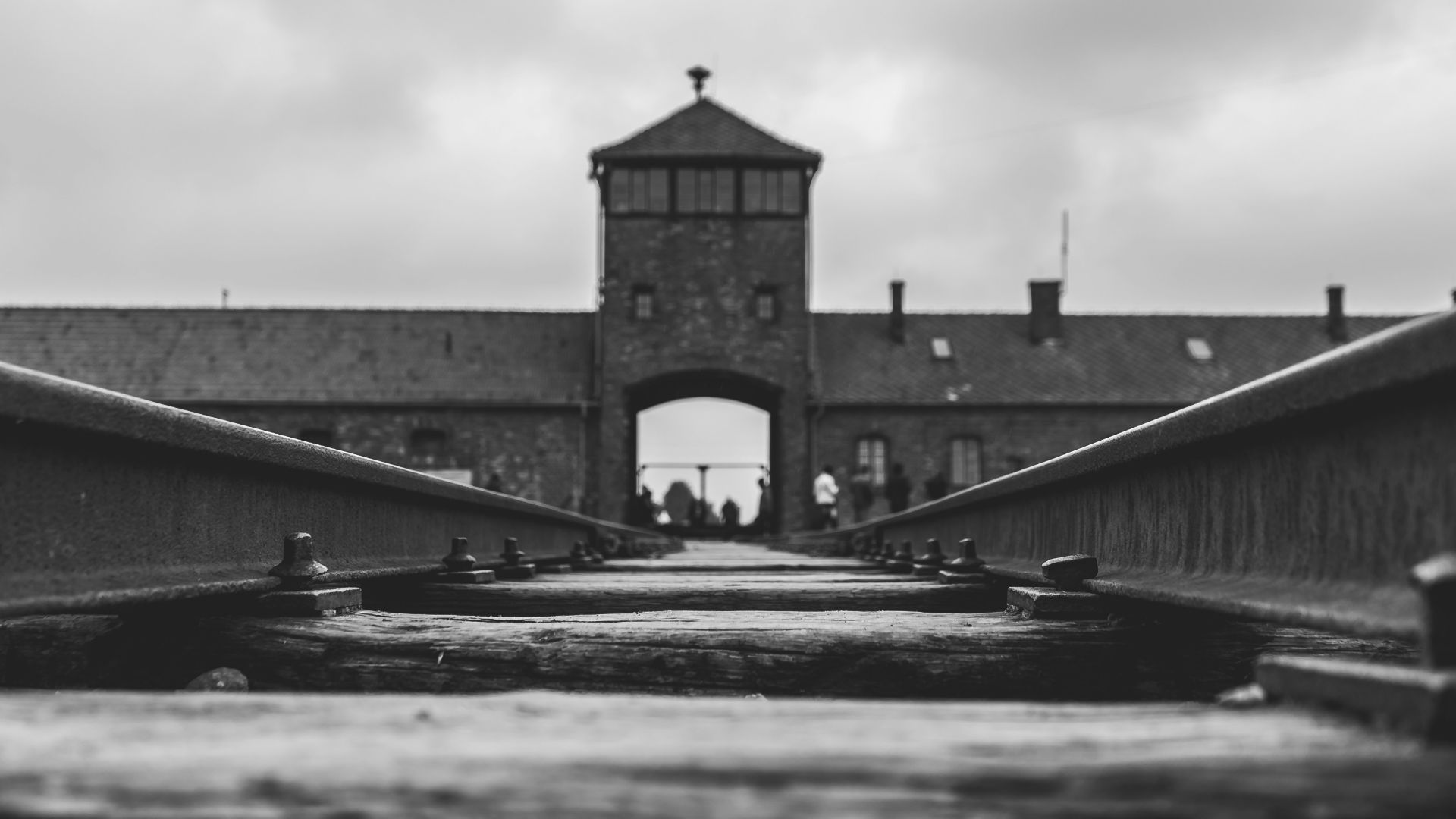 grayscale photo of concrete bridge
