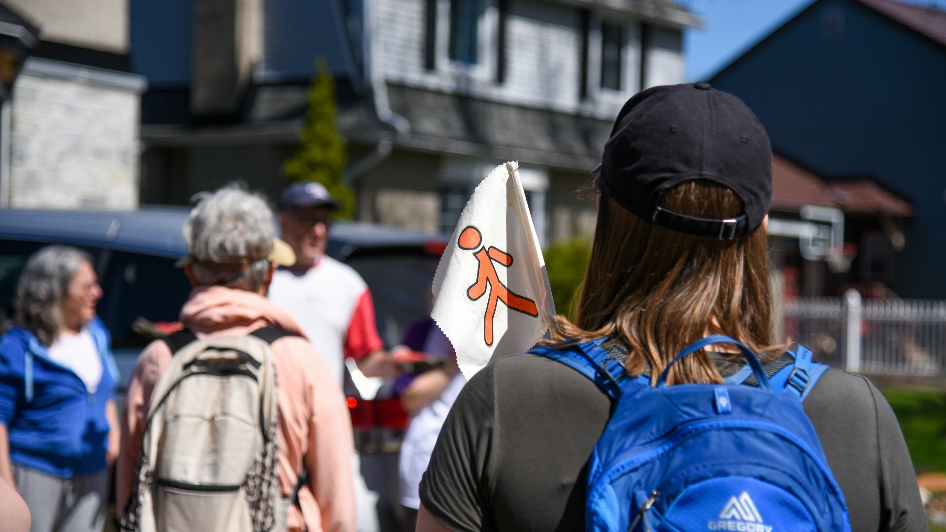 a group of people walking down a street