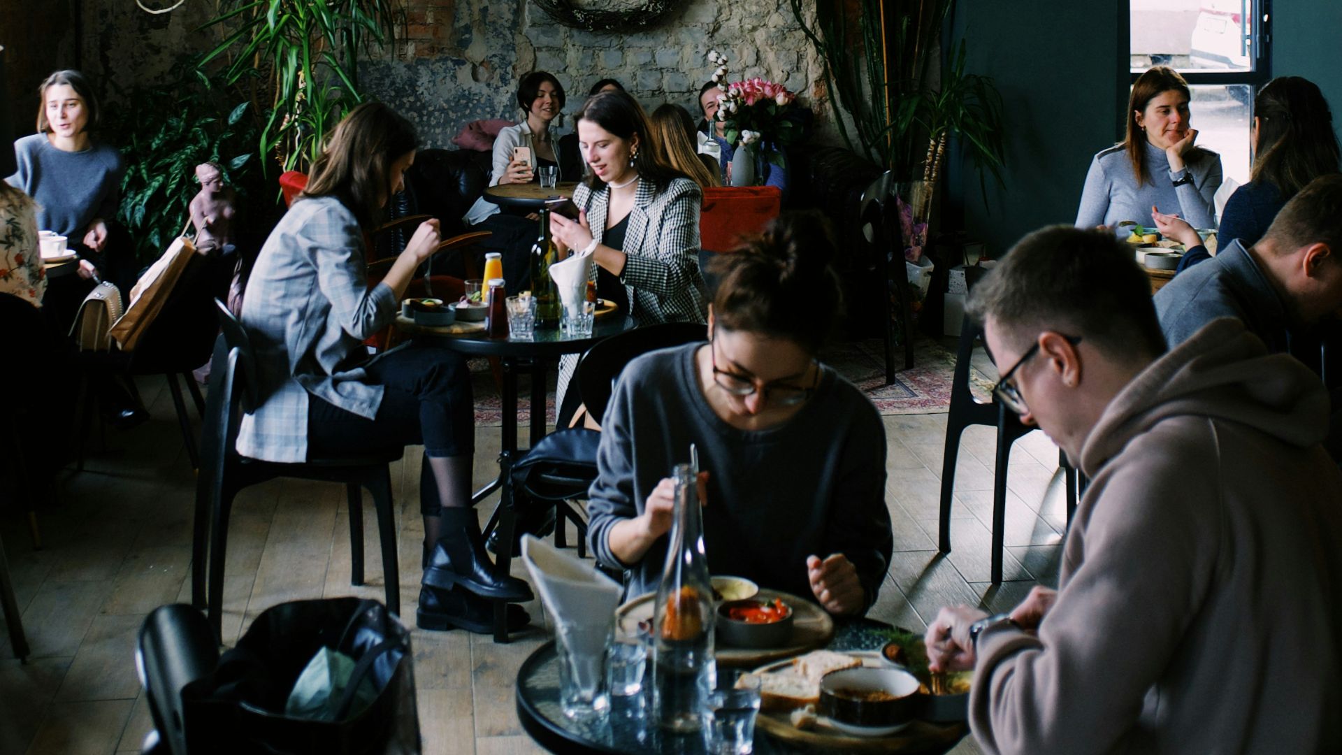 people sitting on chair inside room
