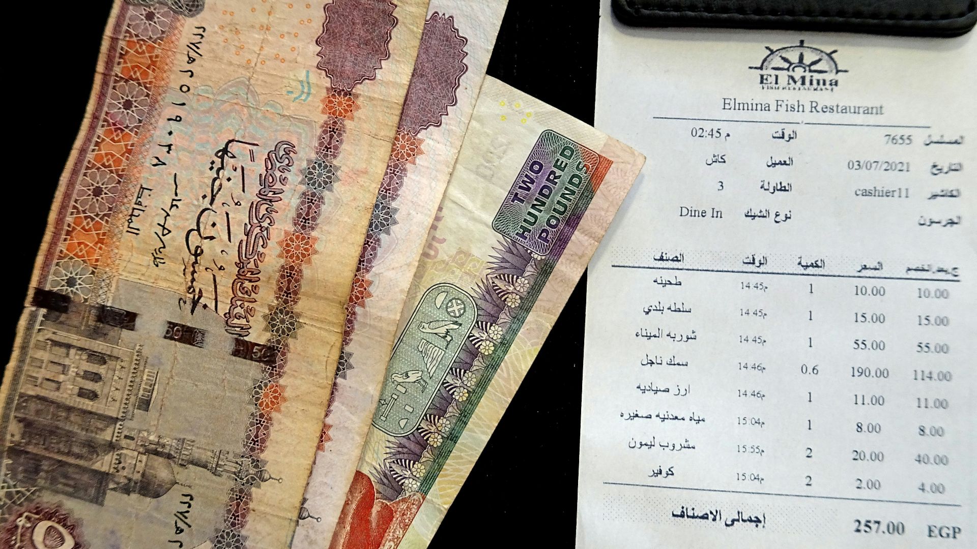 A bunch of money sitting on top of a table