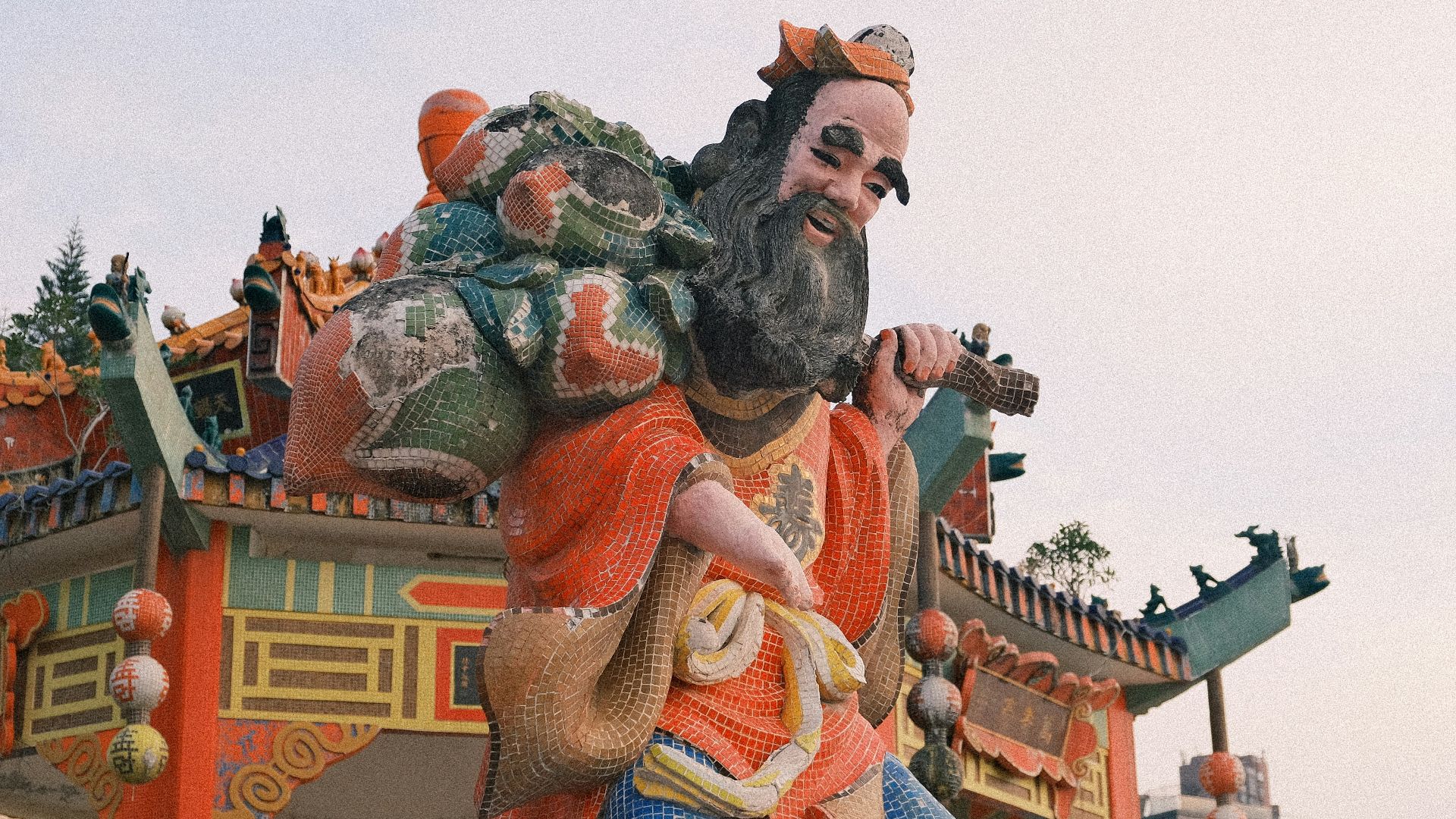 a statue of a man with a beard and a beard