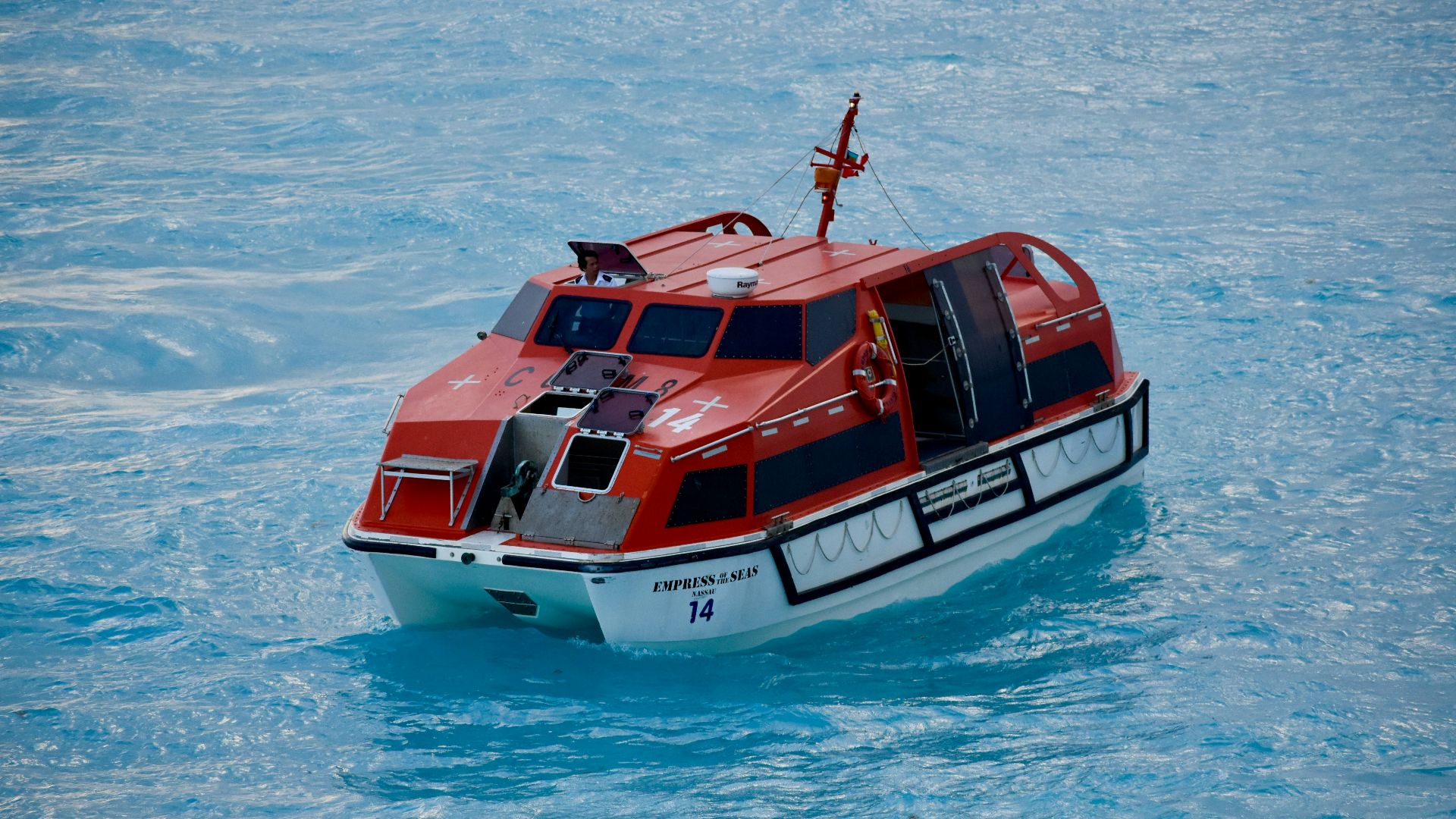 red and white motorboat