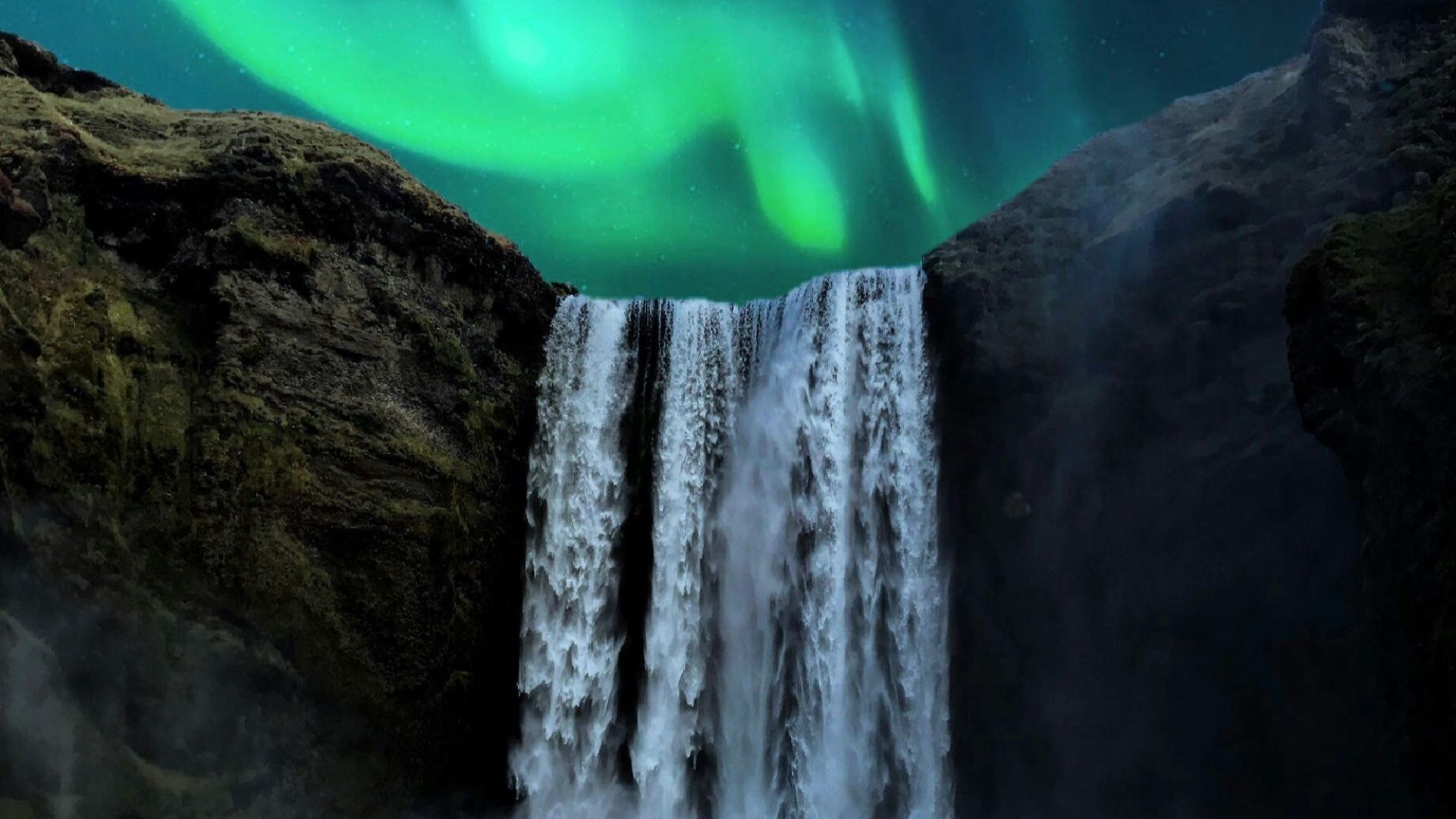 people in the bottom of waterfalls