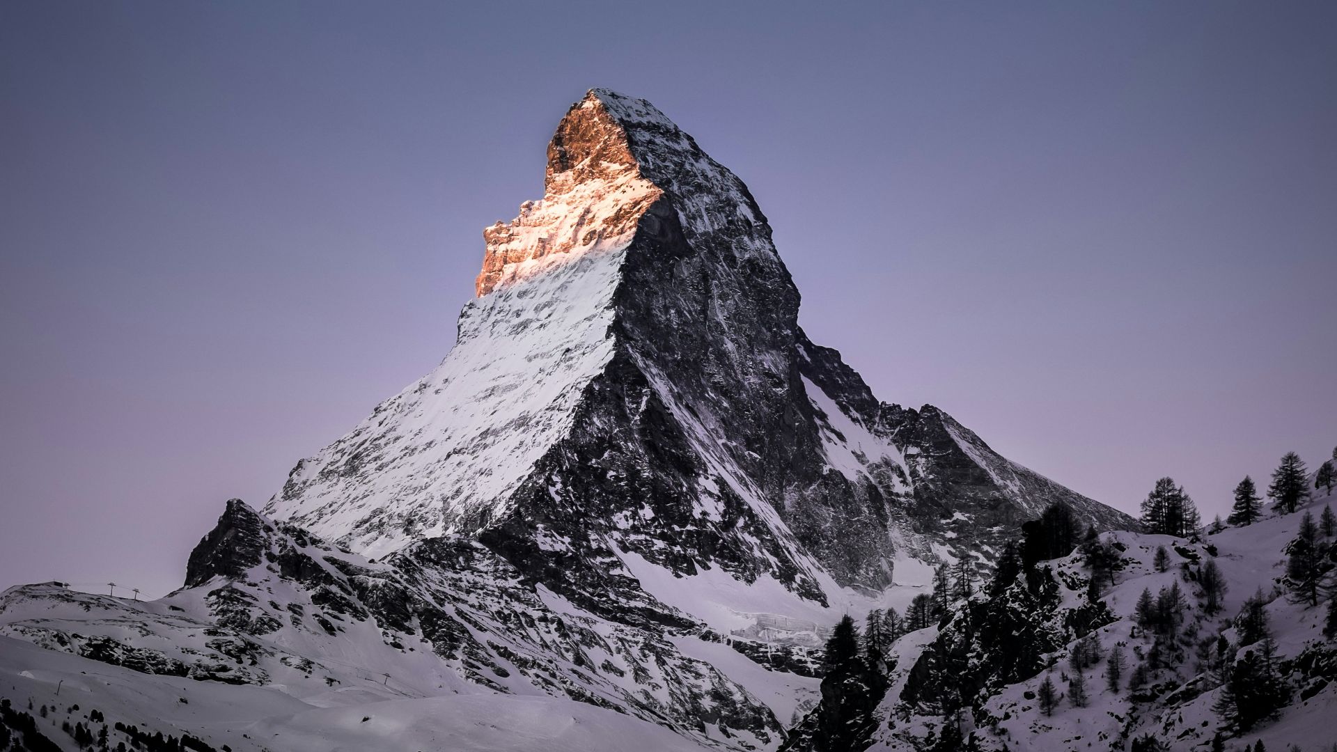 mountain coated with snow
