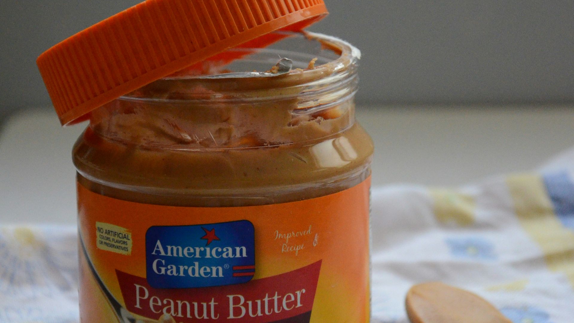 orange and blue labeled jar