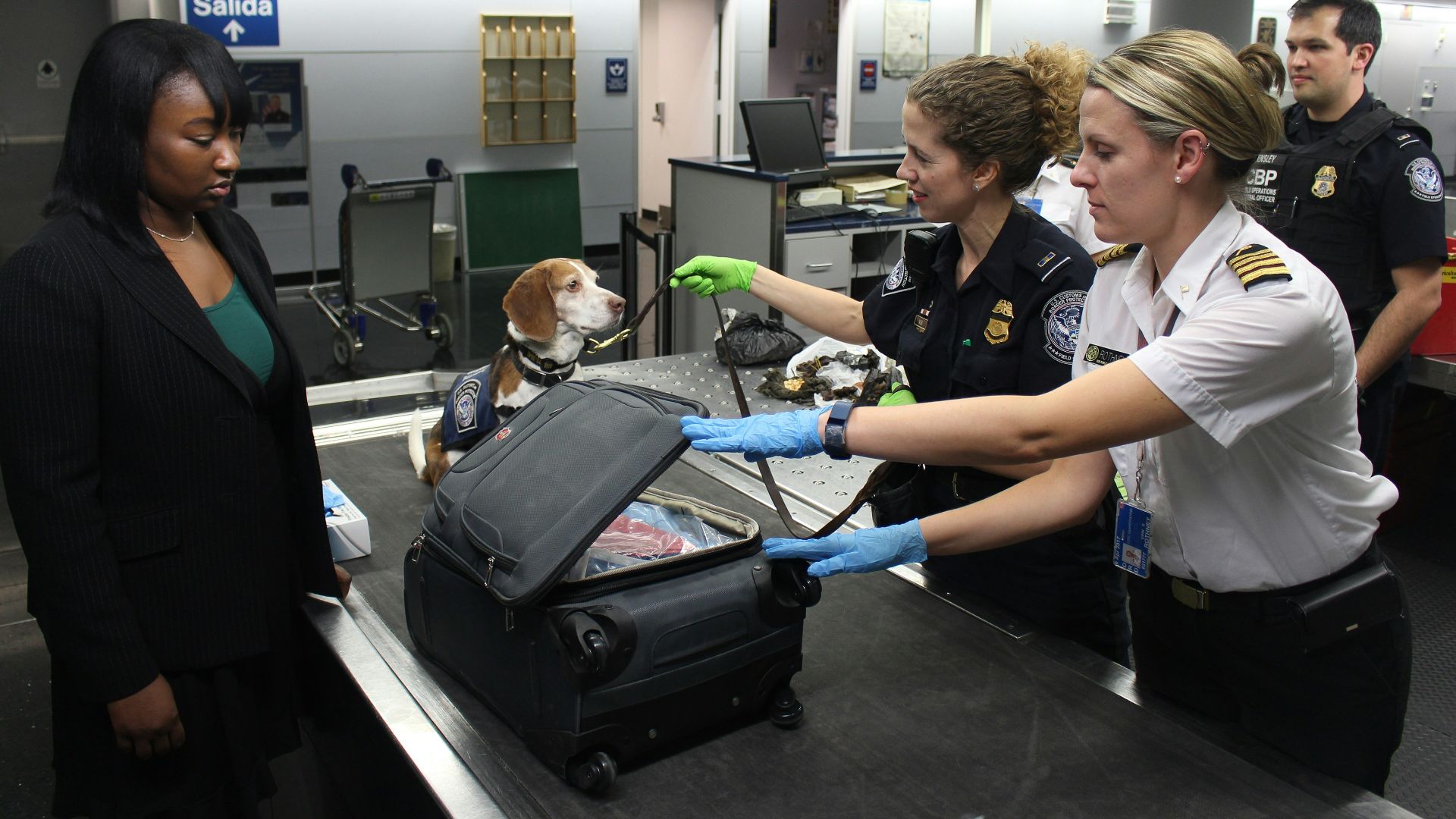 woman in black crew neck t-shirt standing beside woman in white t-shirt
