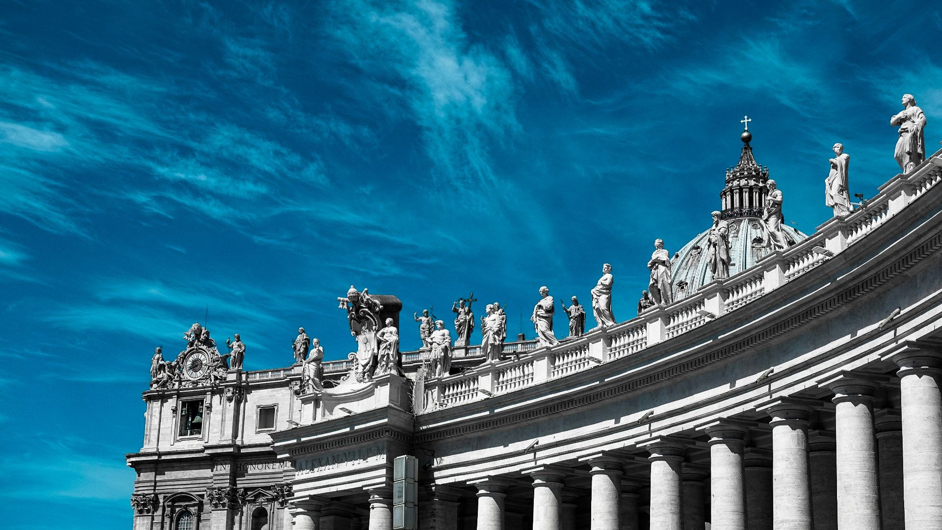 statues on top of building