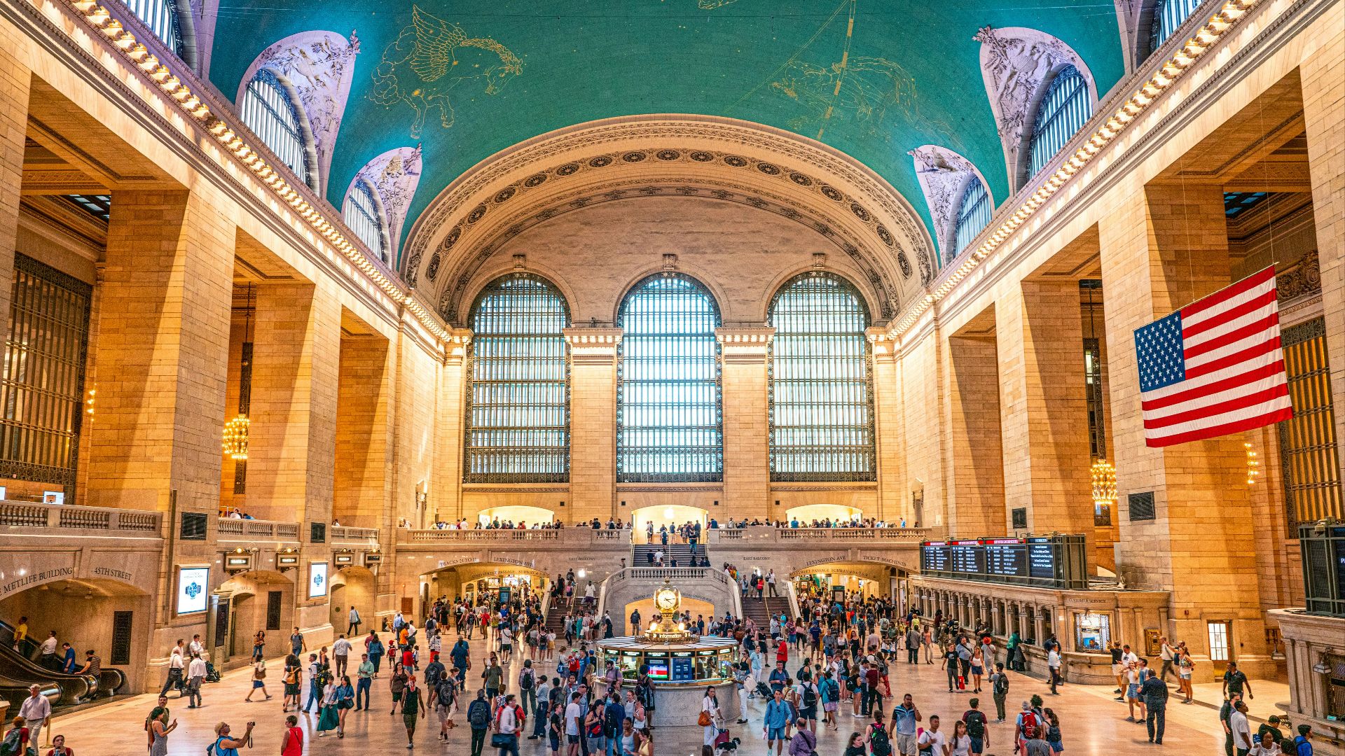 crowd of people walking in Grand Central Terminal