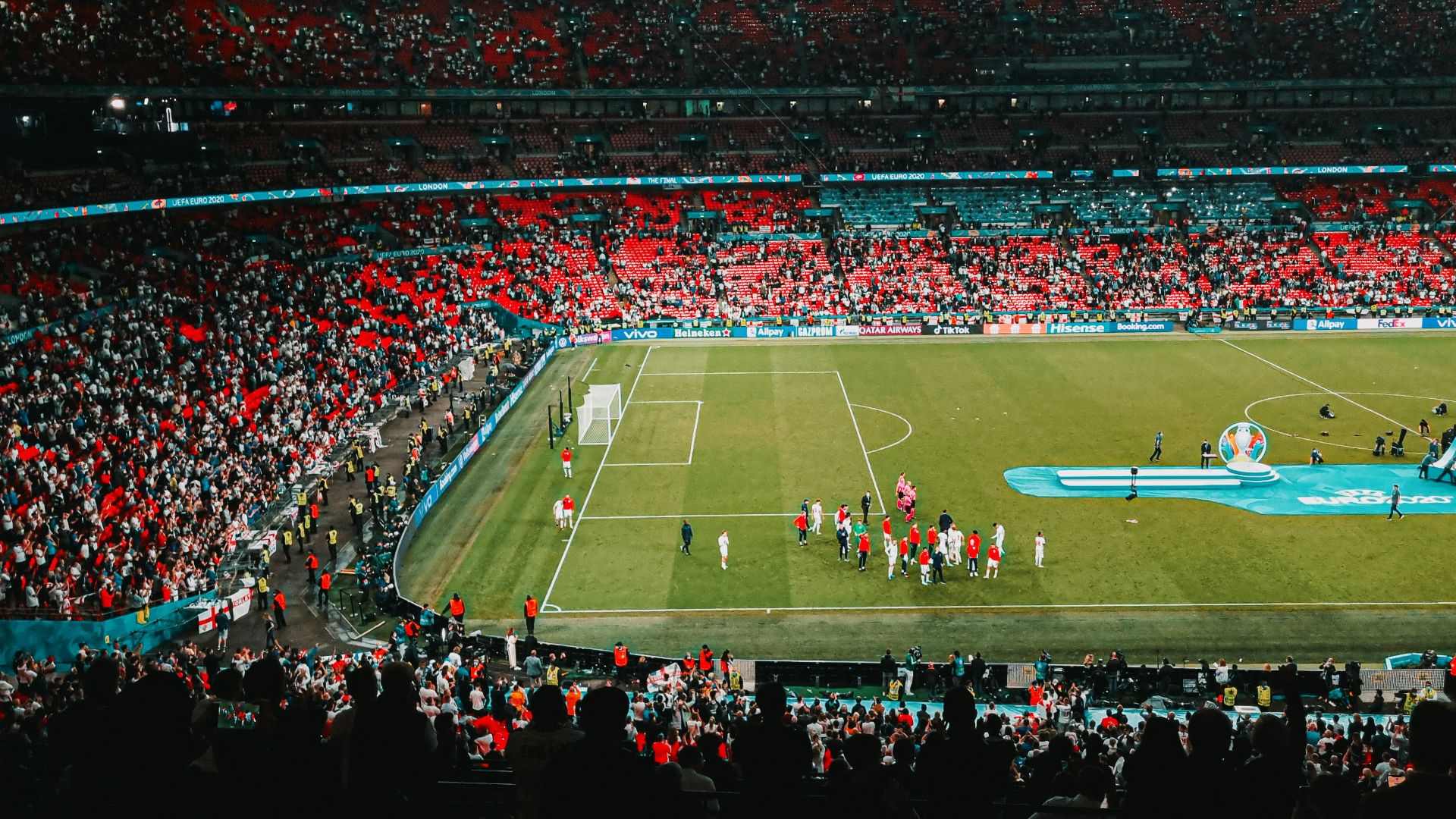 people watching football game on stadium