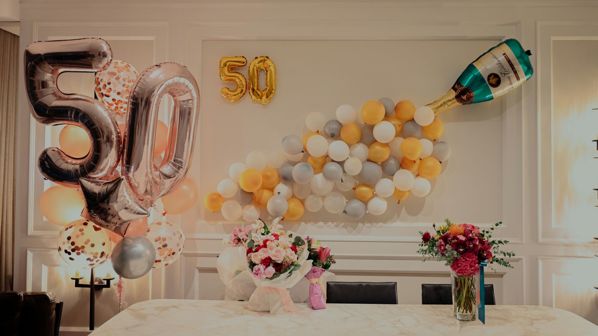 yellow and white balloons on table