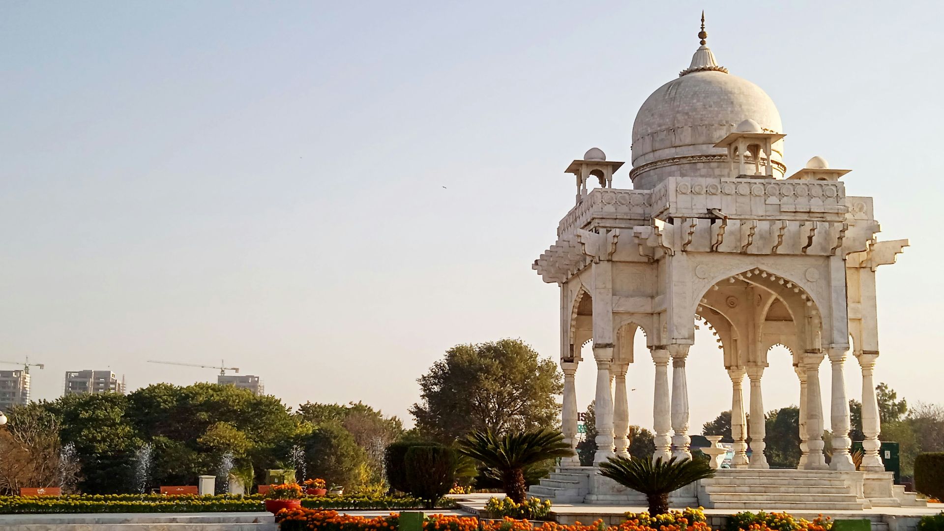 white dome building near green trees during daytime