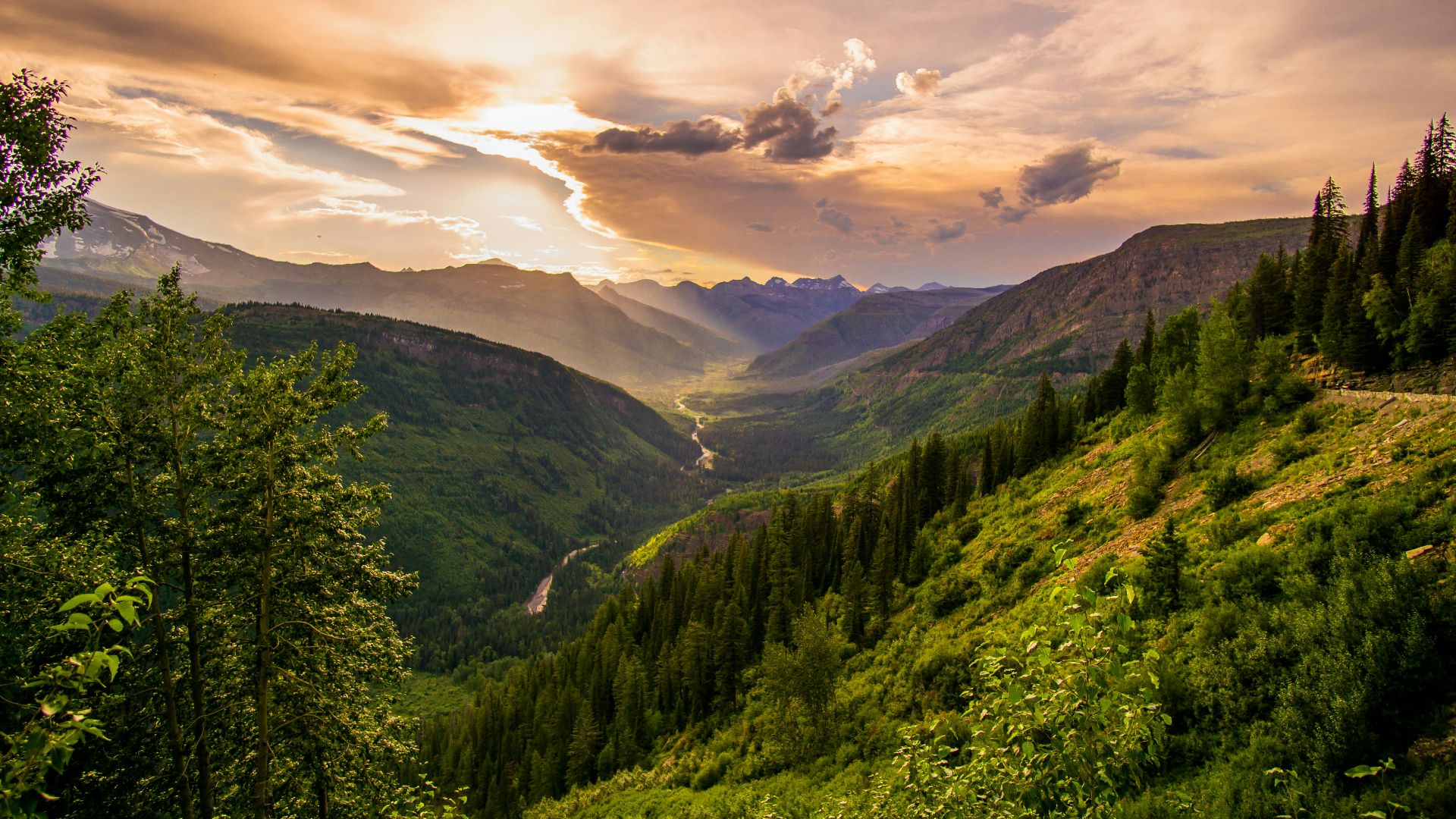 river and mountain ranges under white clouds