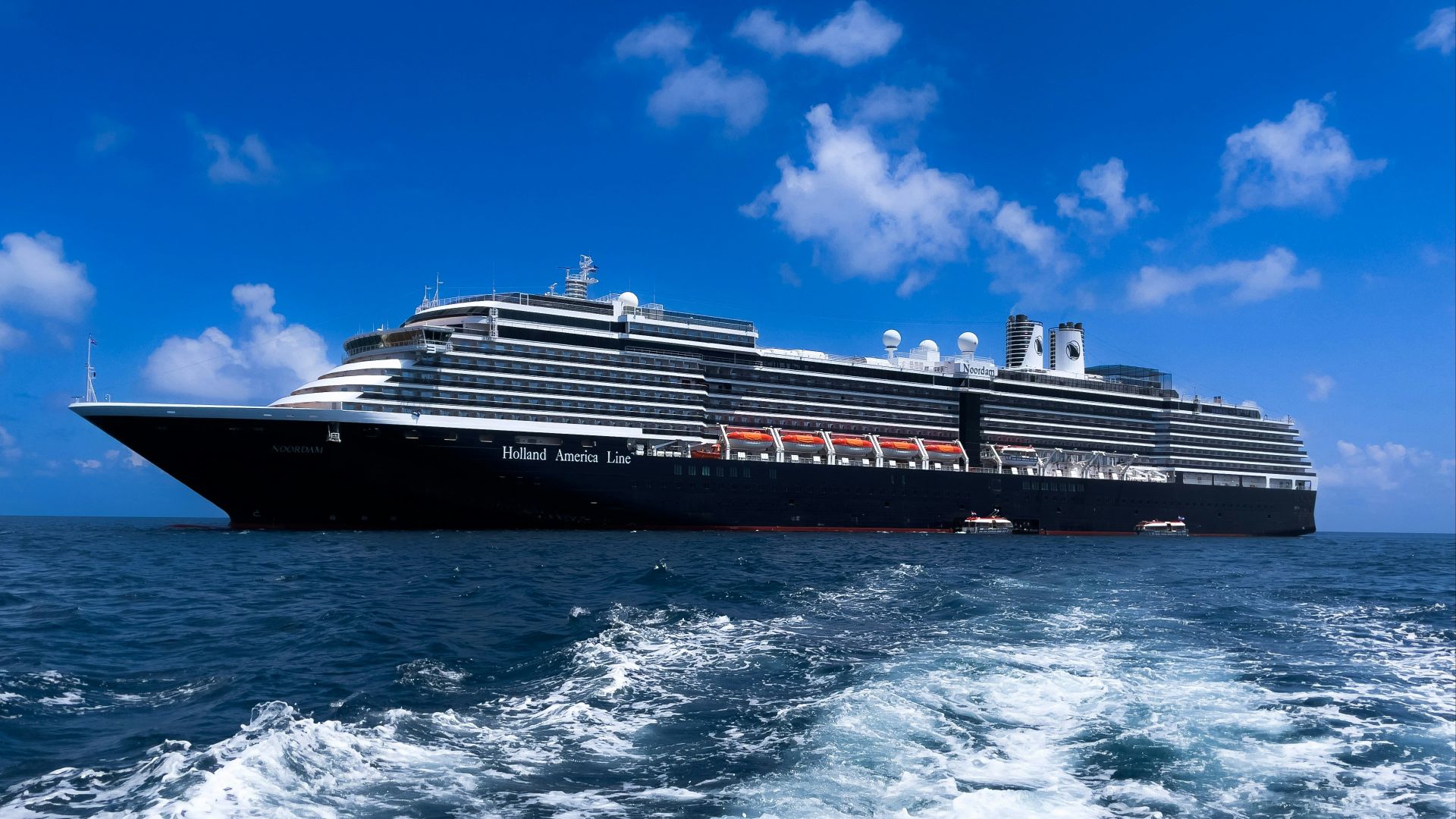 a large cruise ship in the middle of the ocean