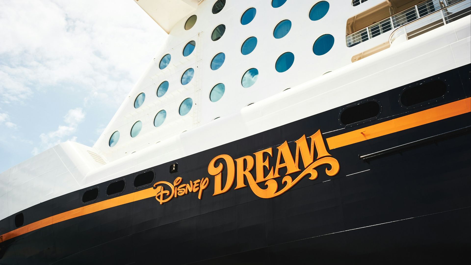a disney cruise ship with the word dream painted on it