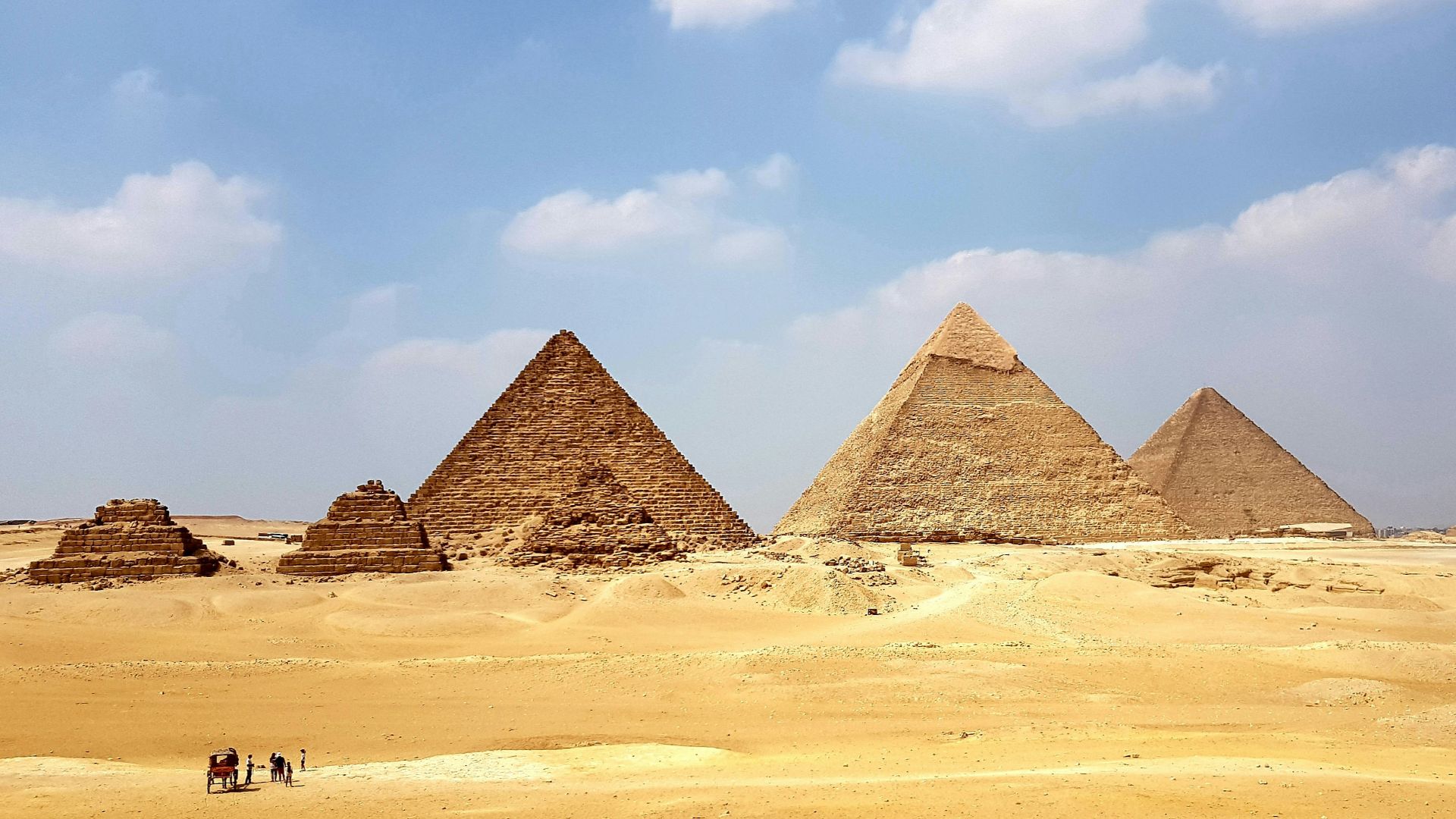 brown pyramid under blue sky during daytime