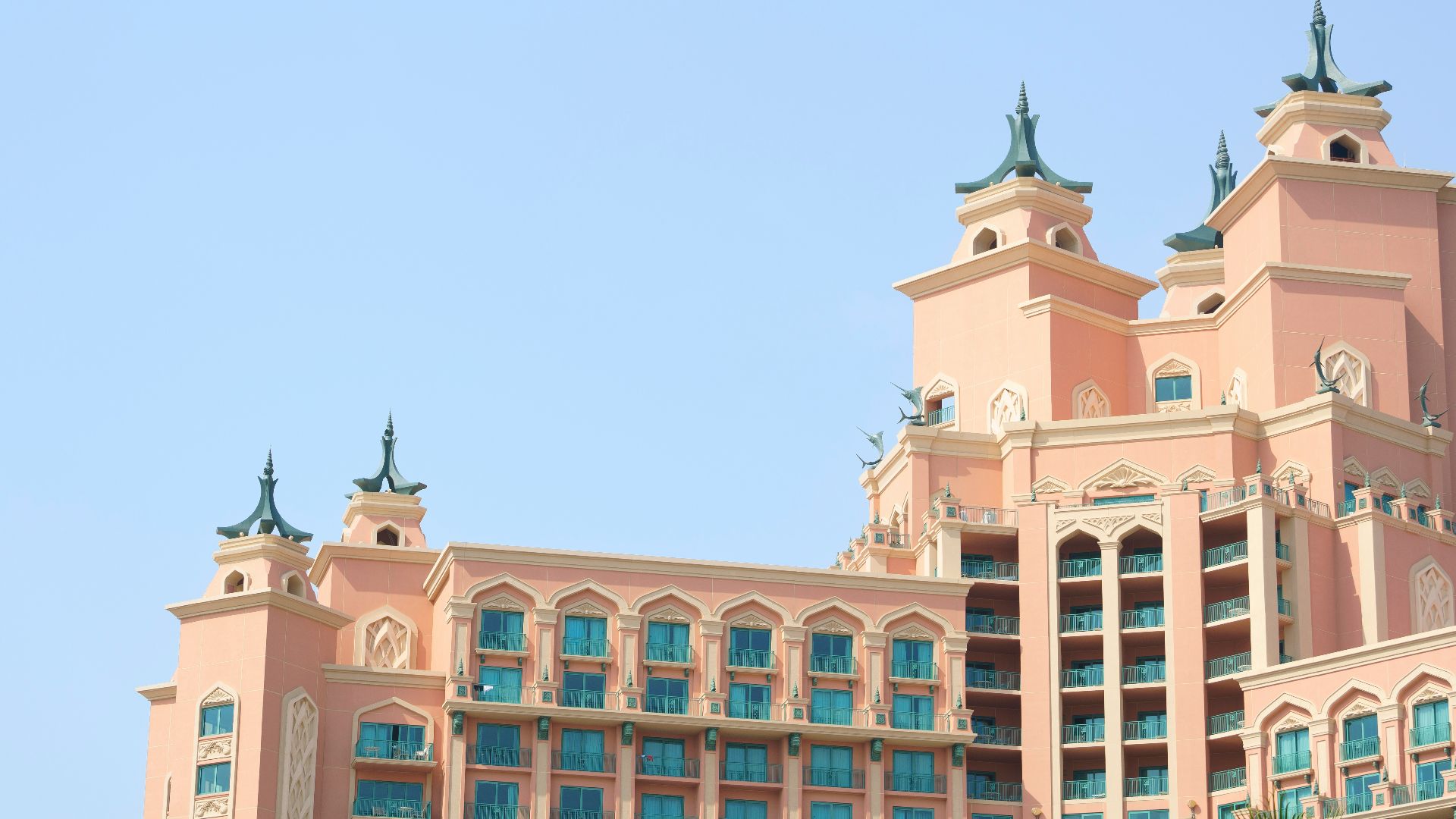 A large building with a clock on the top of it