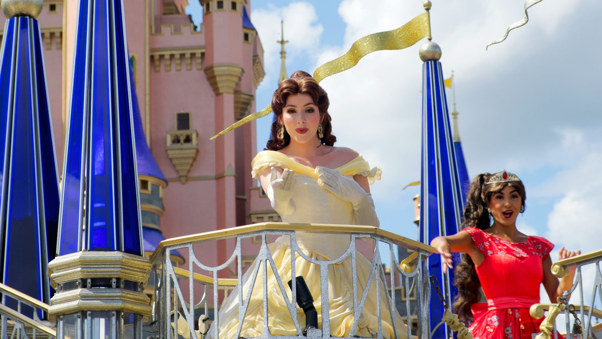 woman in white dress standing on the stairs
