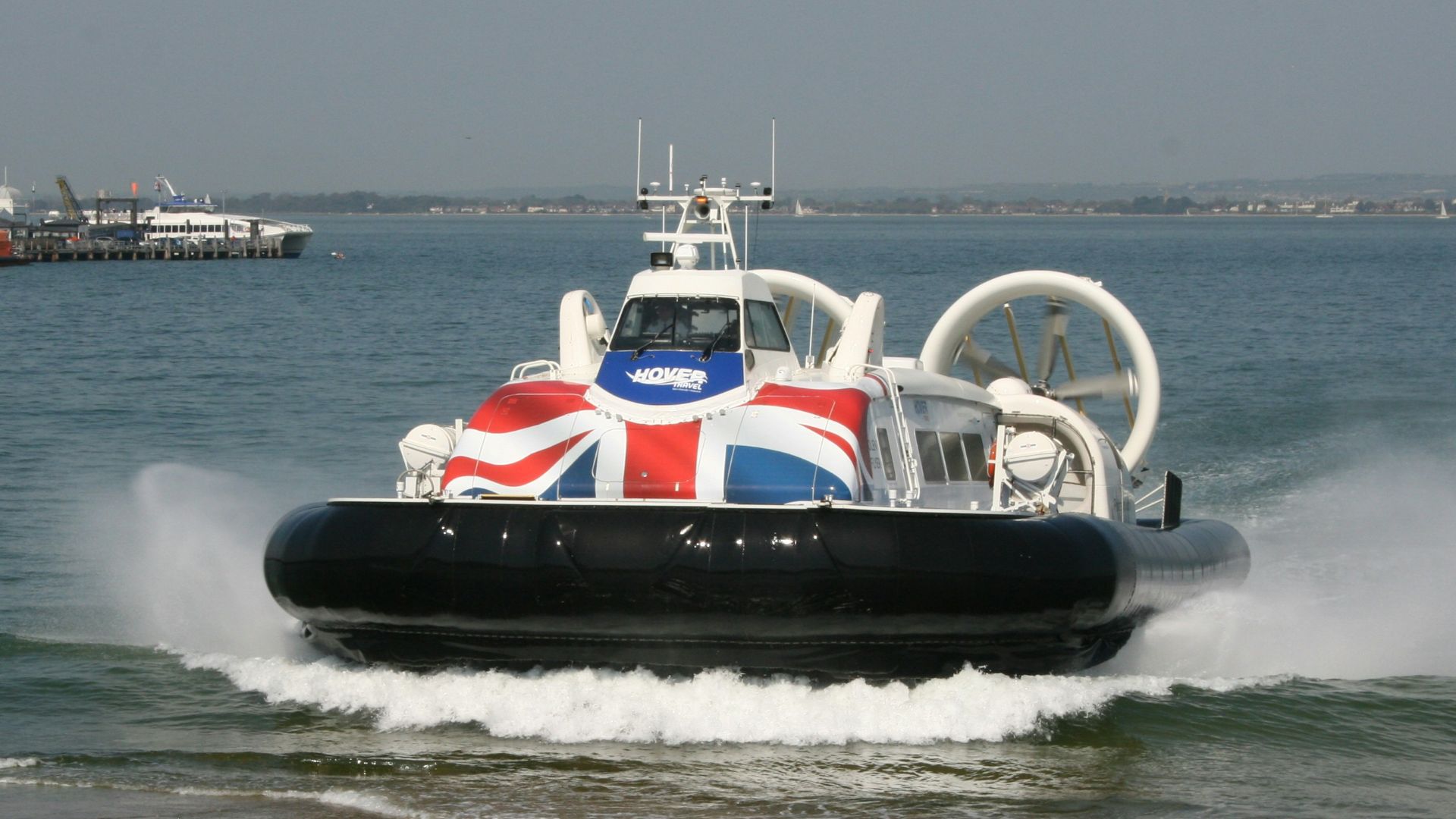 a black and white boat in the water