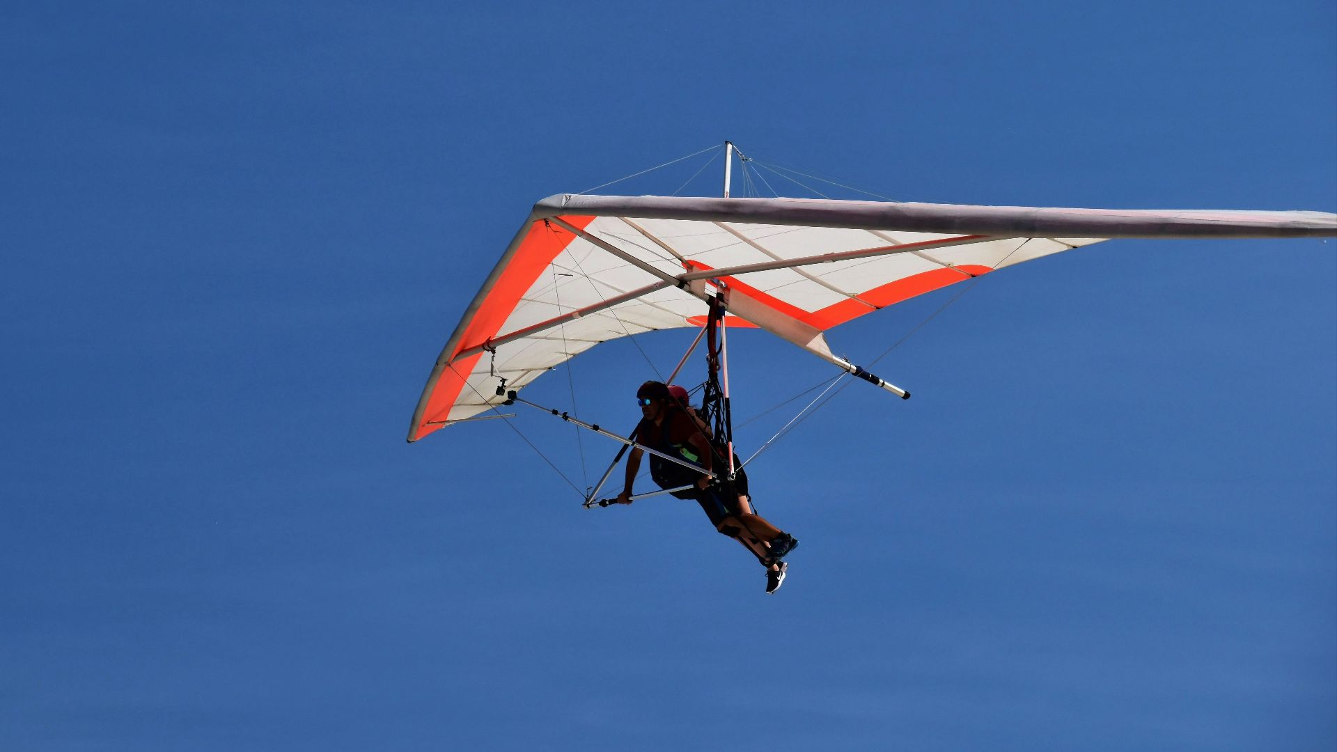 a person on a parachute in the air