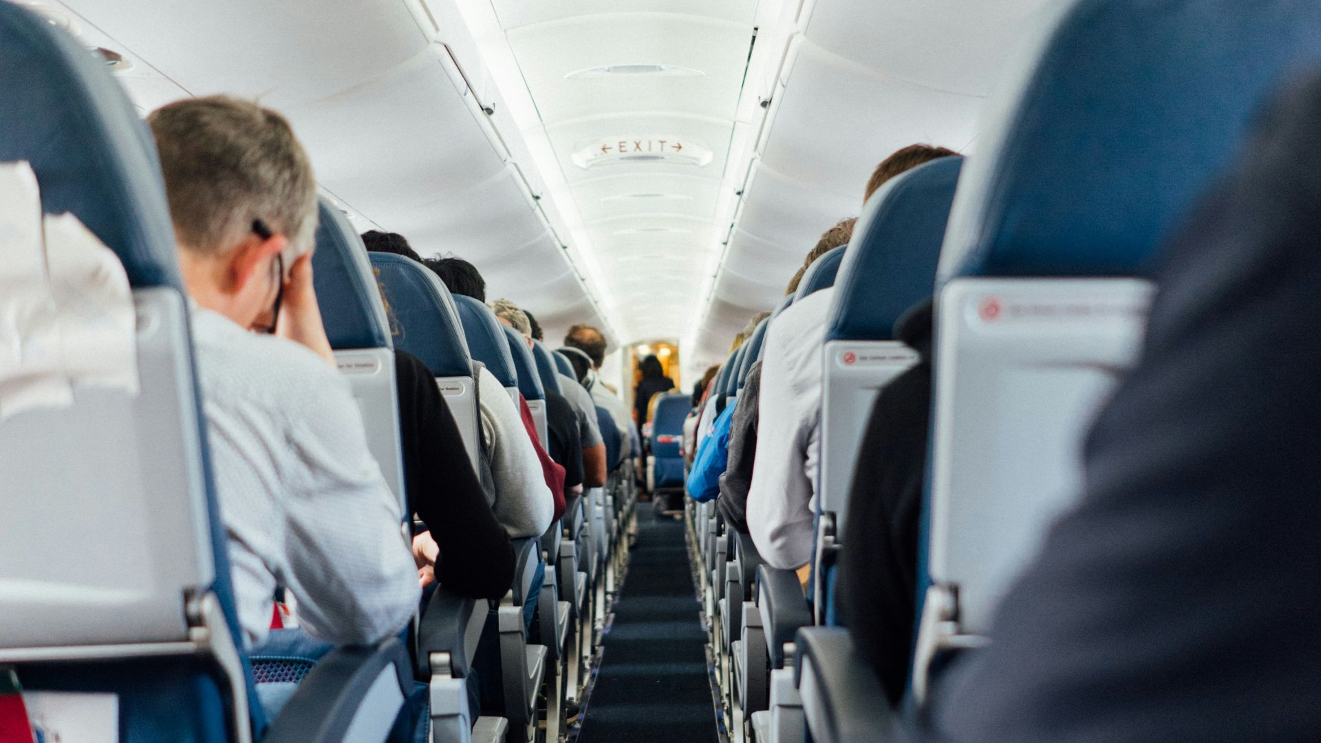 people sitting inside plane