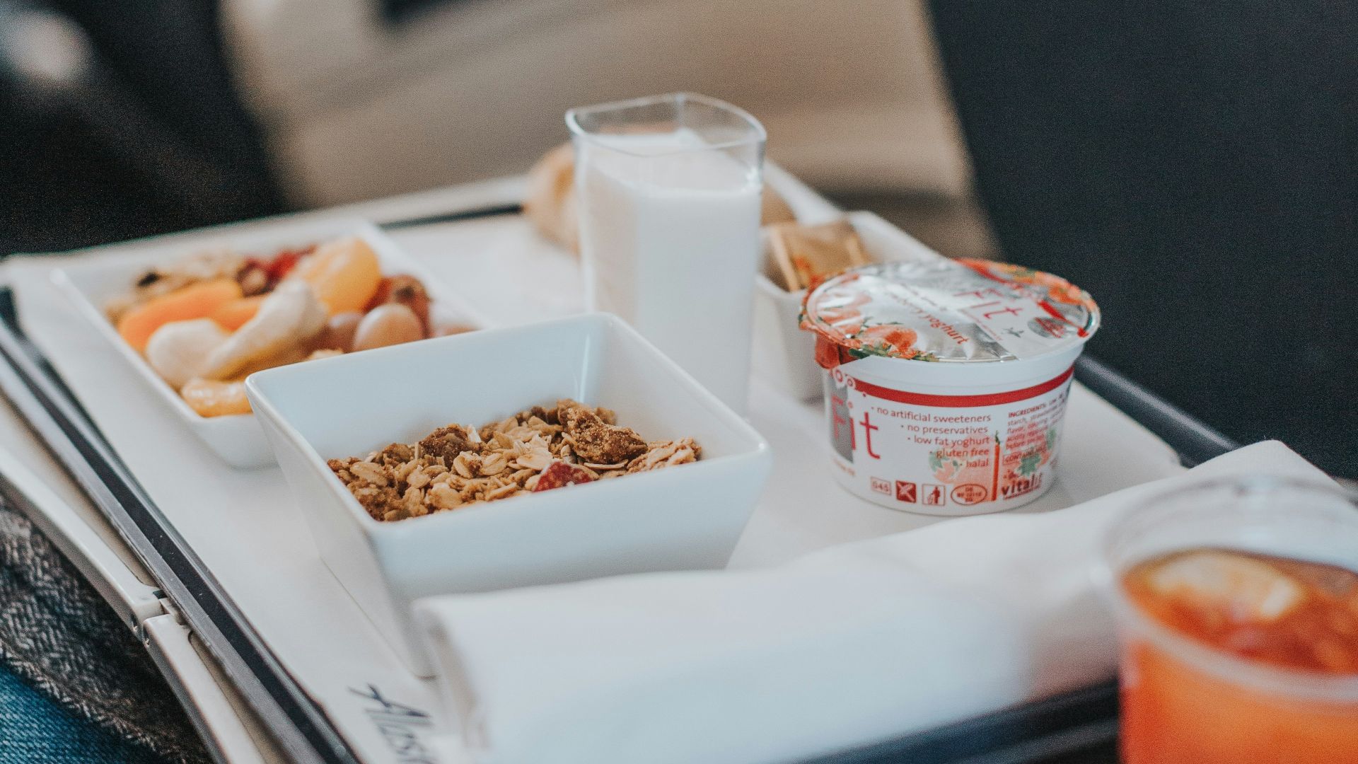 red liquid on cup beside bowl