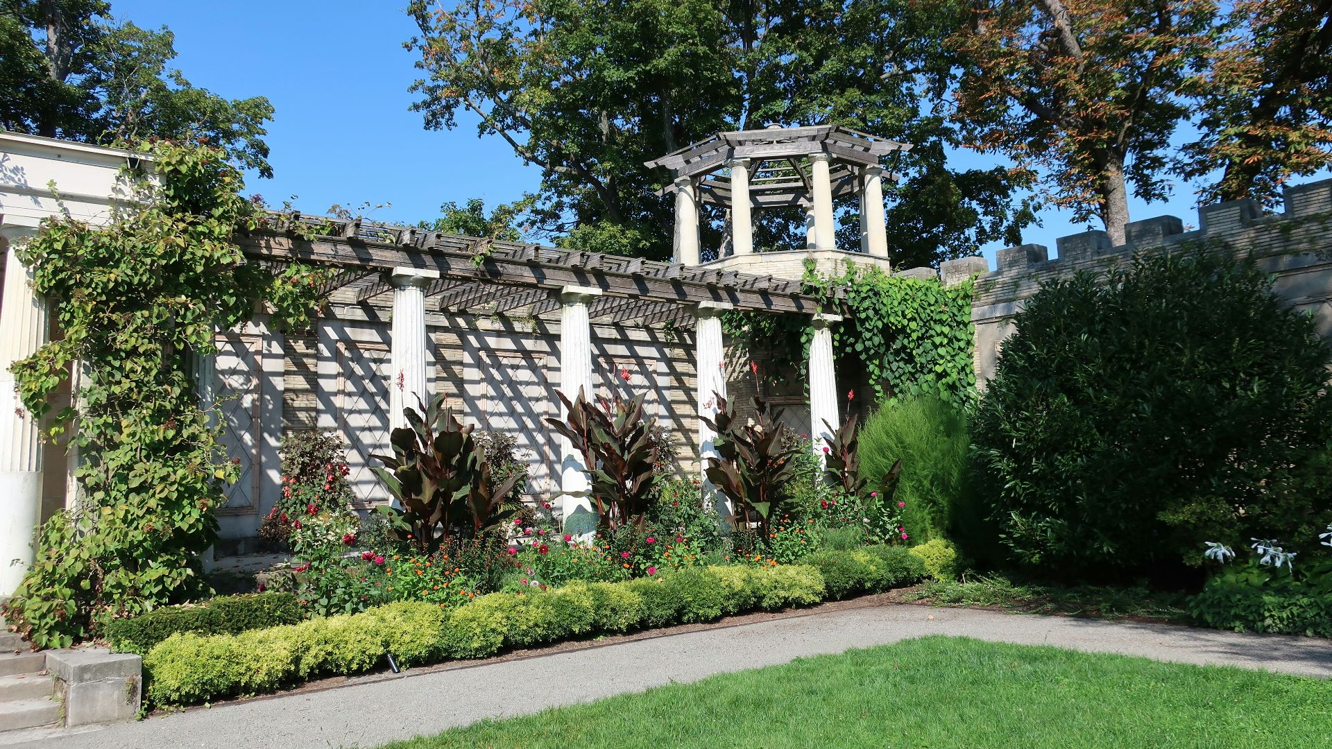 a building with a garden in front of it