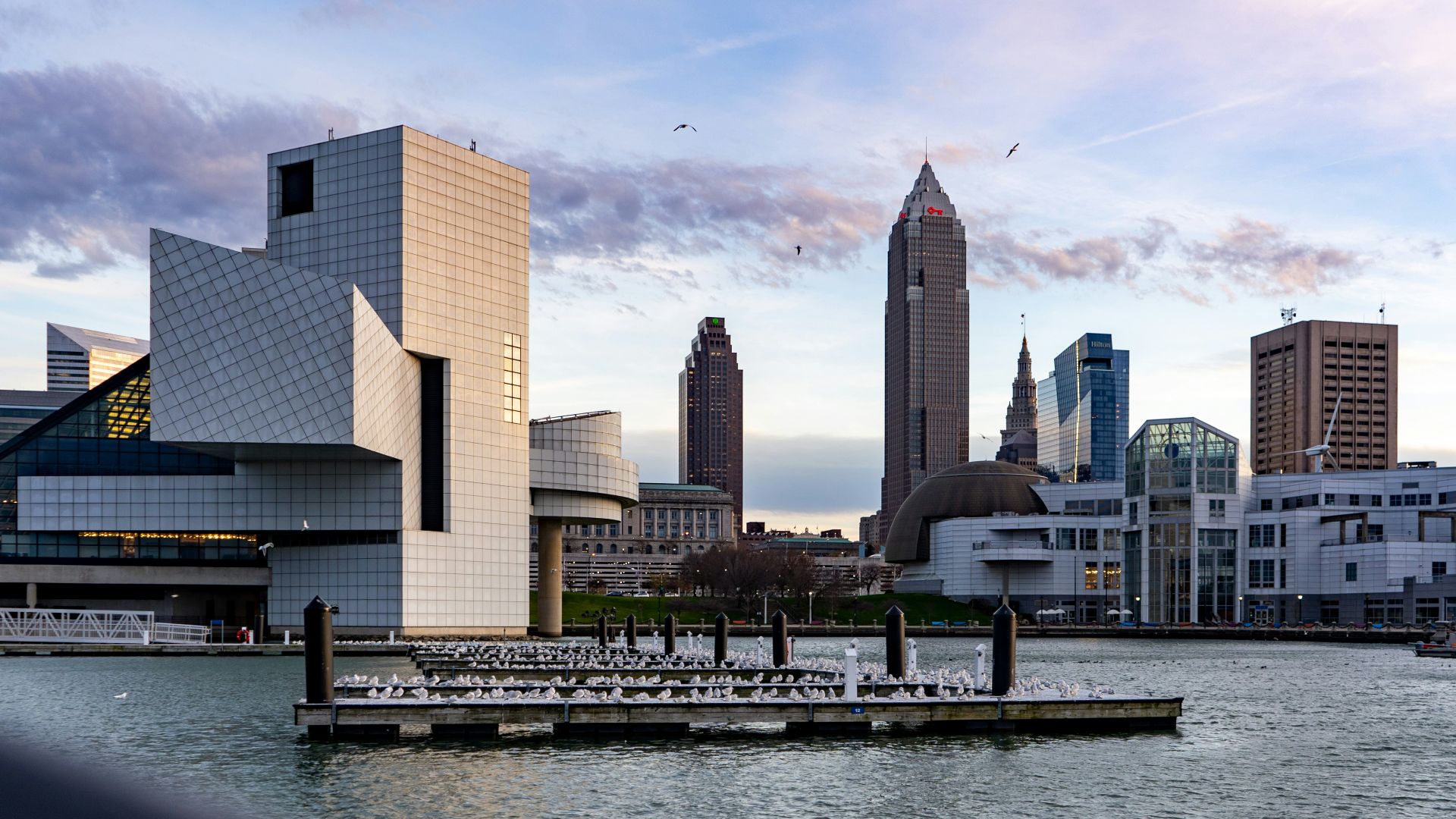 city skyline across body of water during daytime