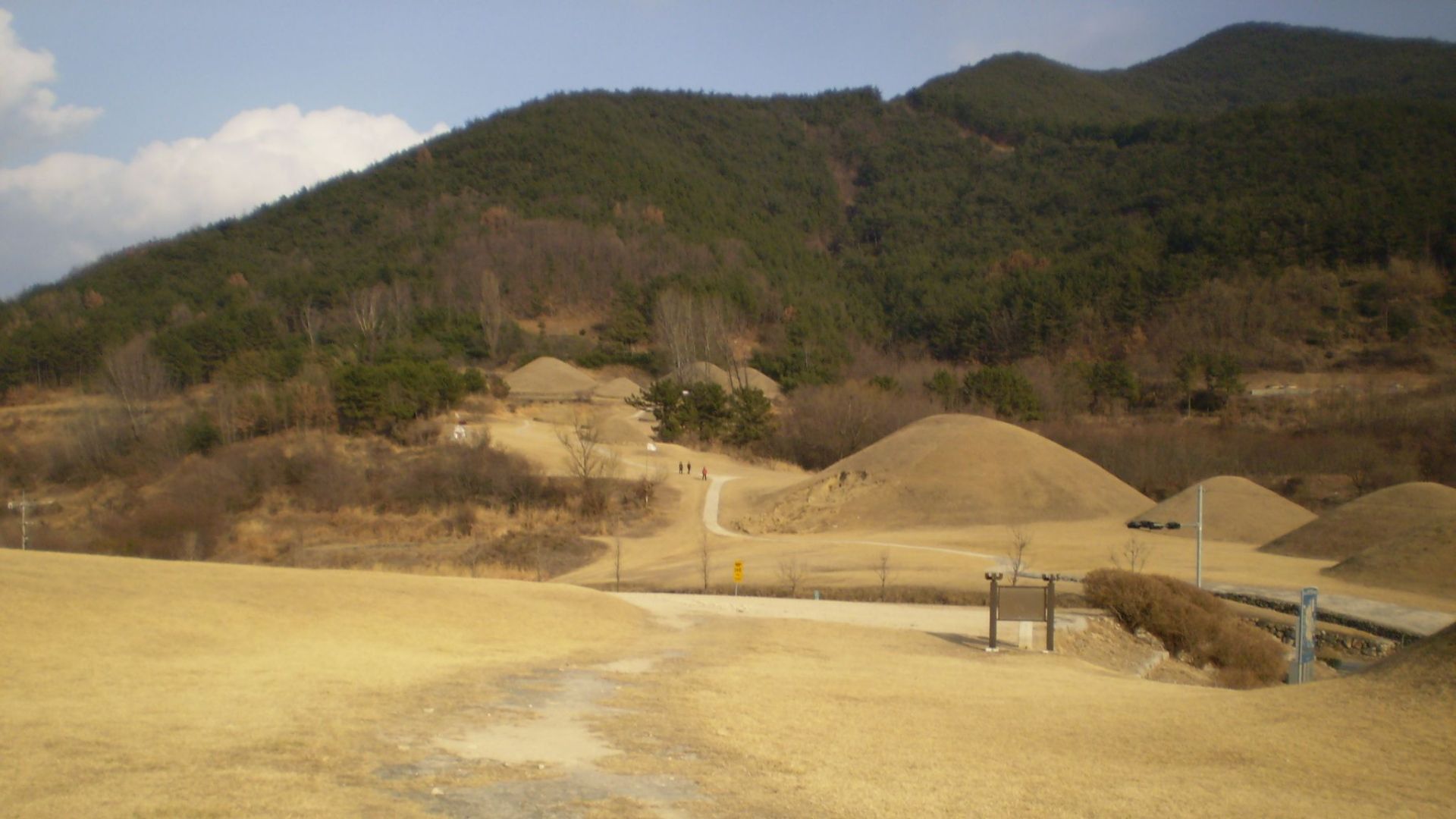 File:Changnyeong upper tombs wide.jpg