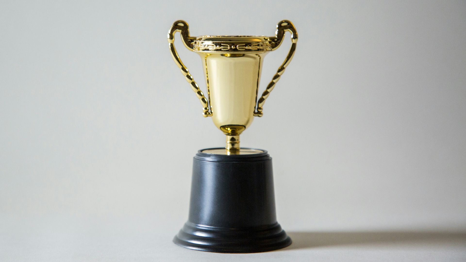 yellow and white trophy