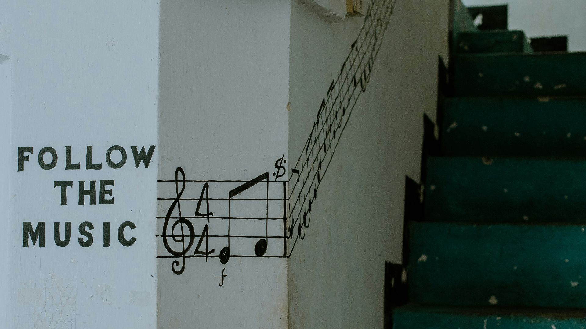 a set of stairs with a musical note painted on it