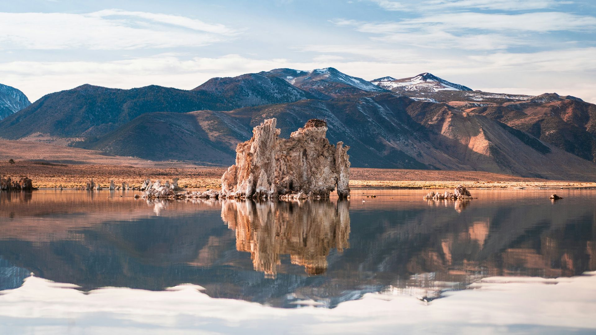 a large body of water surrounded by mountains