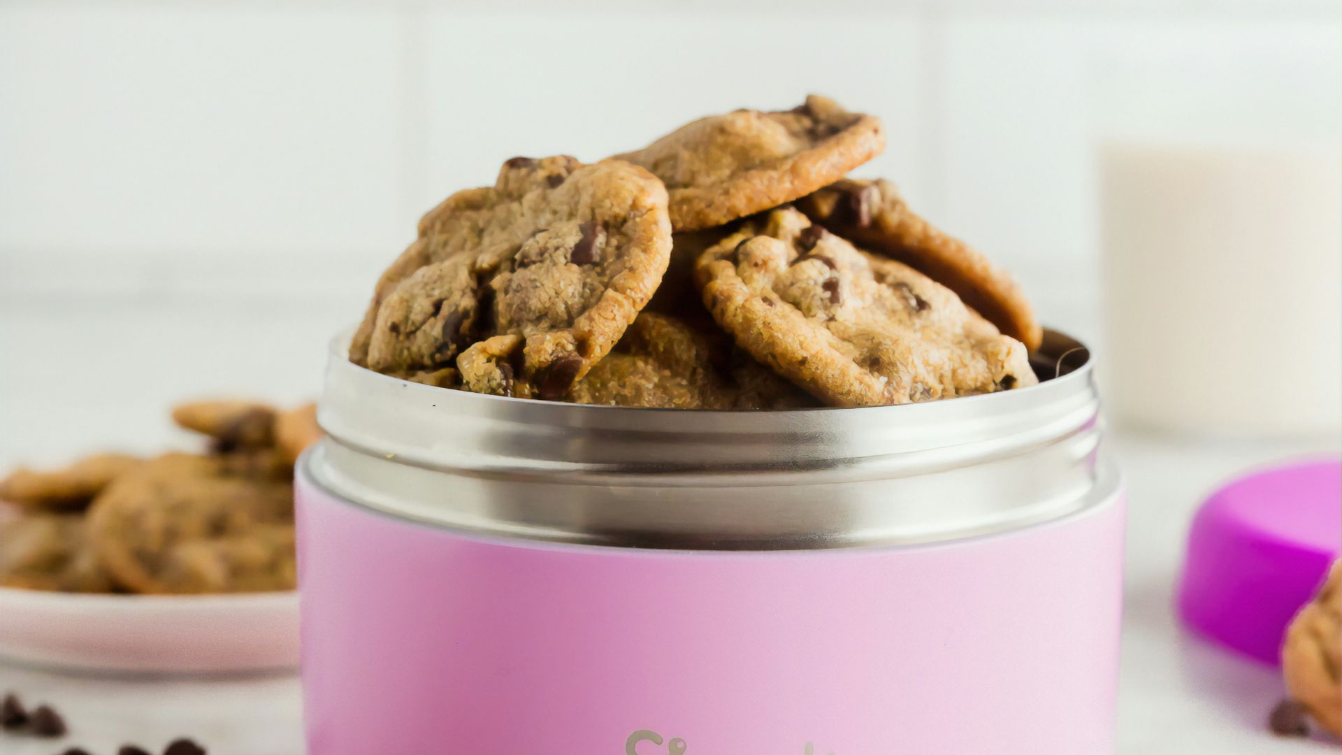 bunch of cookies in pink food container