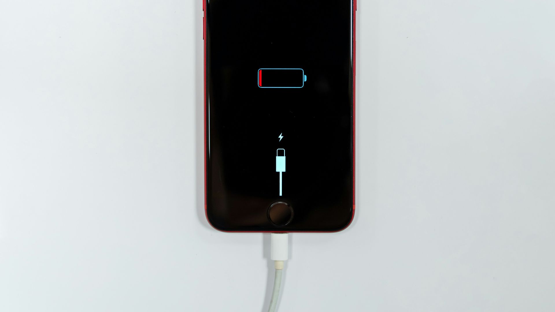 black iphone 5 on white surface