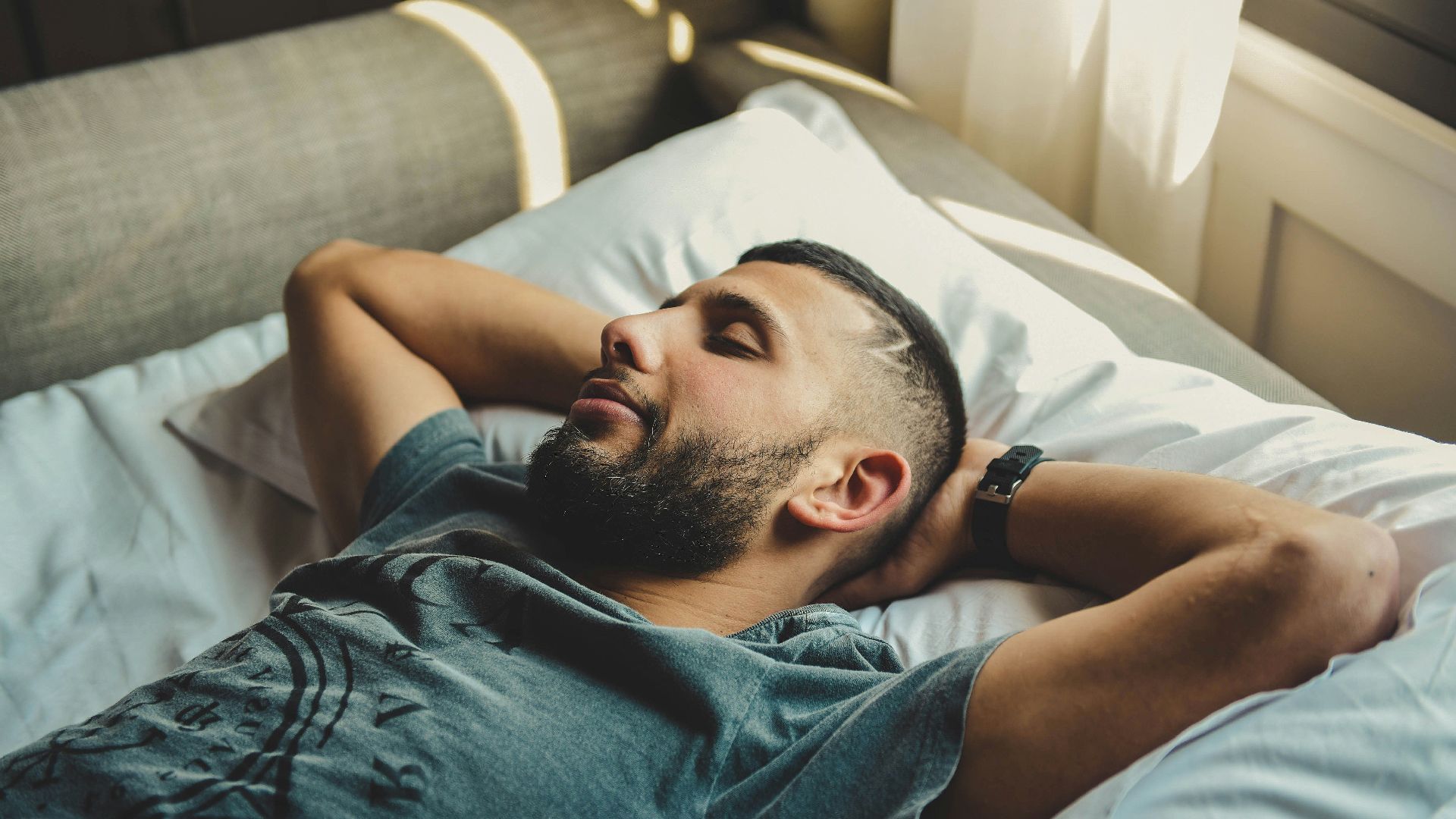 man lying on bed