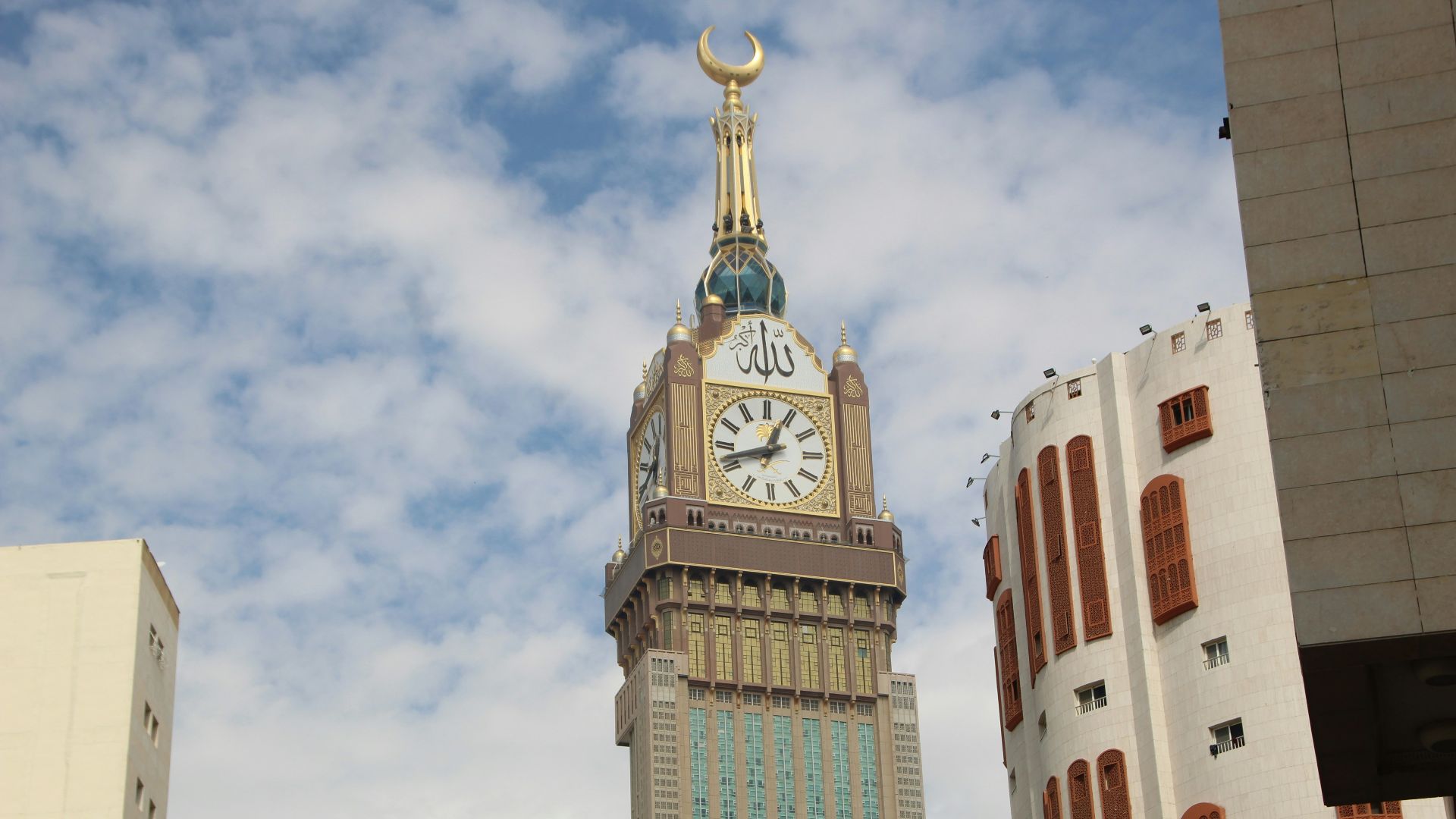 A tall clock tower towering over a city