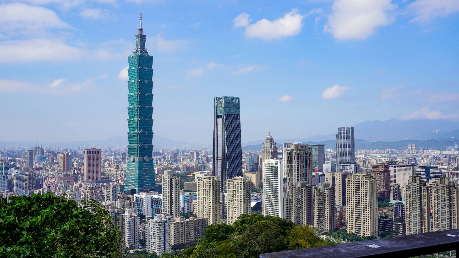 city skyline under blue sky during daytime