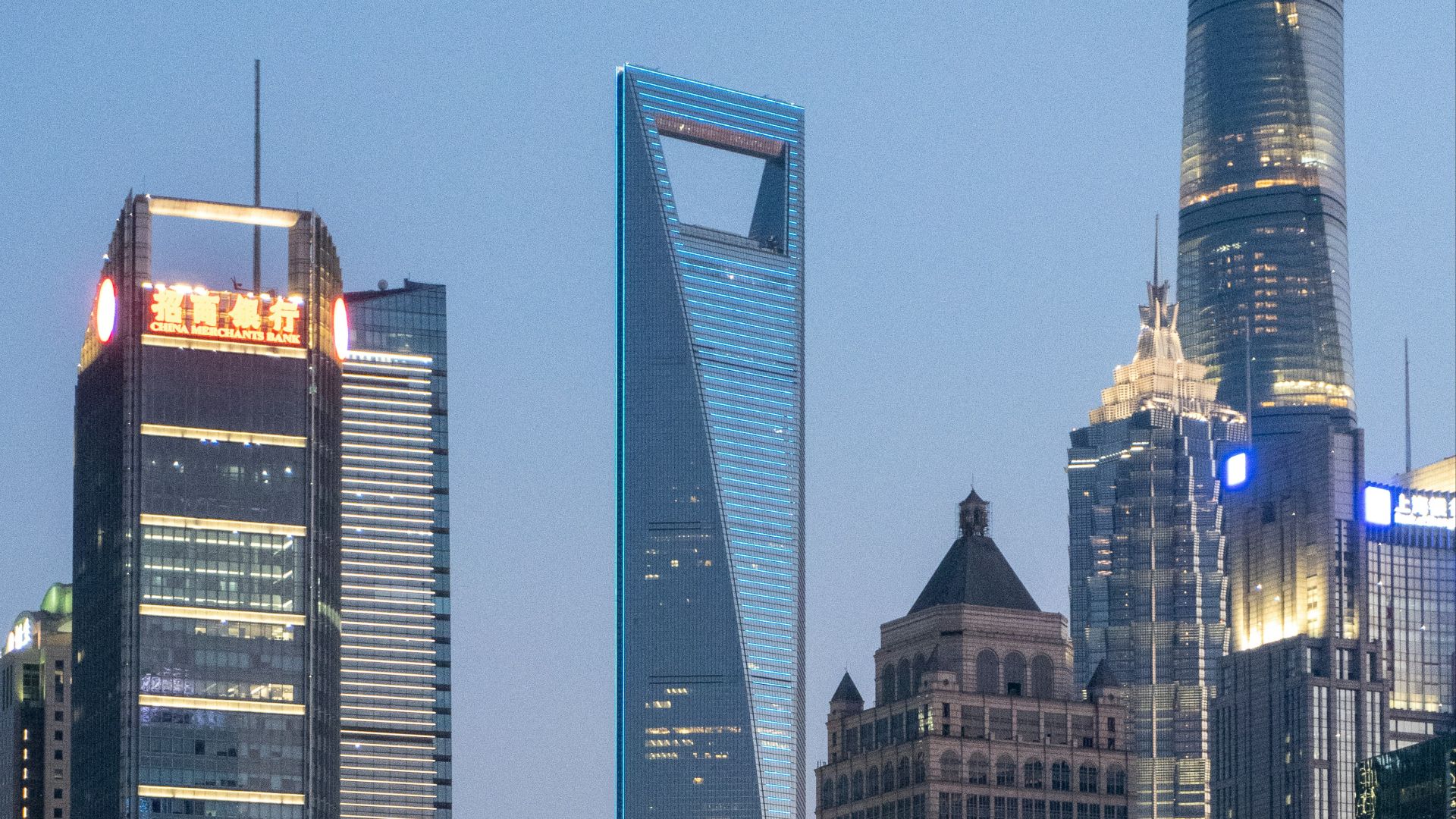 city buildings under blue sky during daytime