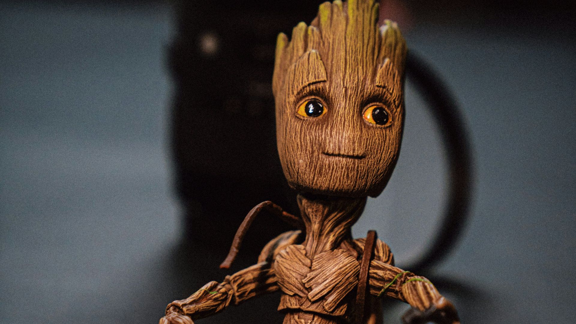 brown wooden animal figurine on black table